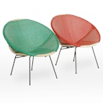 Two Mid Century Modern Plastic Wicker and Black Iron Saucer Chairs