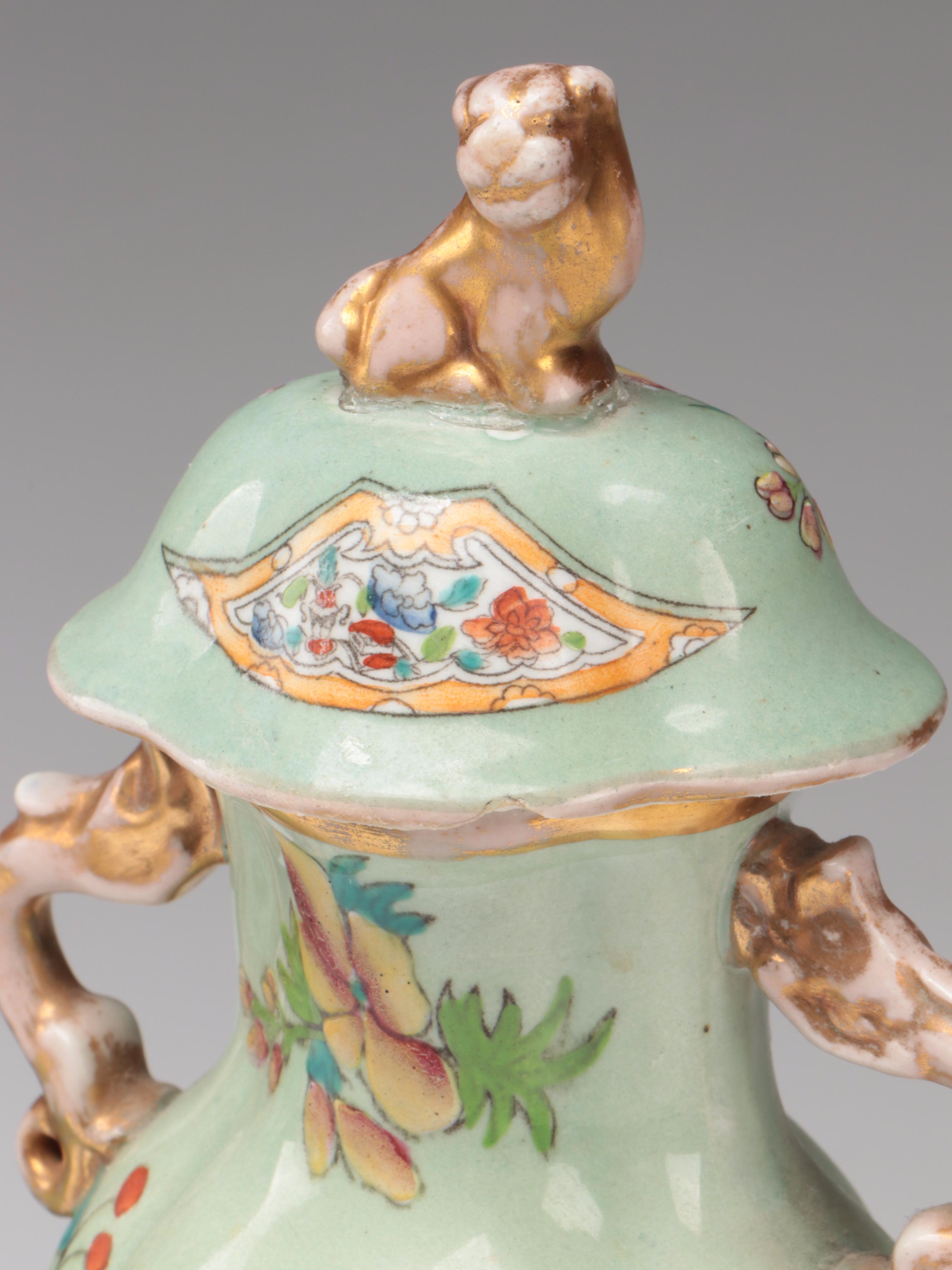 Chinese Celadon Ground Lidded Porcelain Vases with Guardian Lion Finials