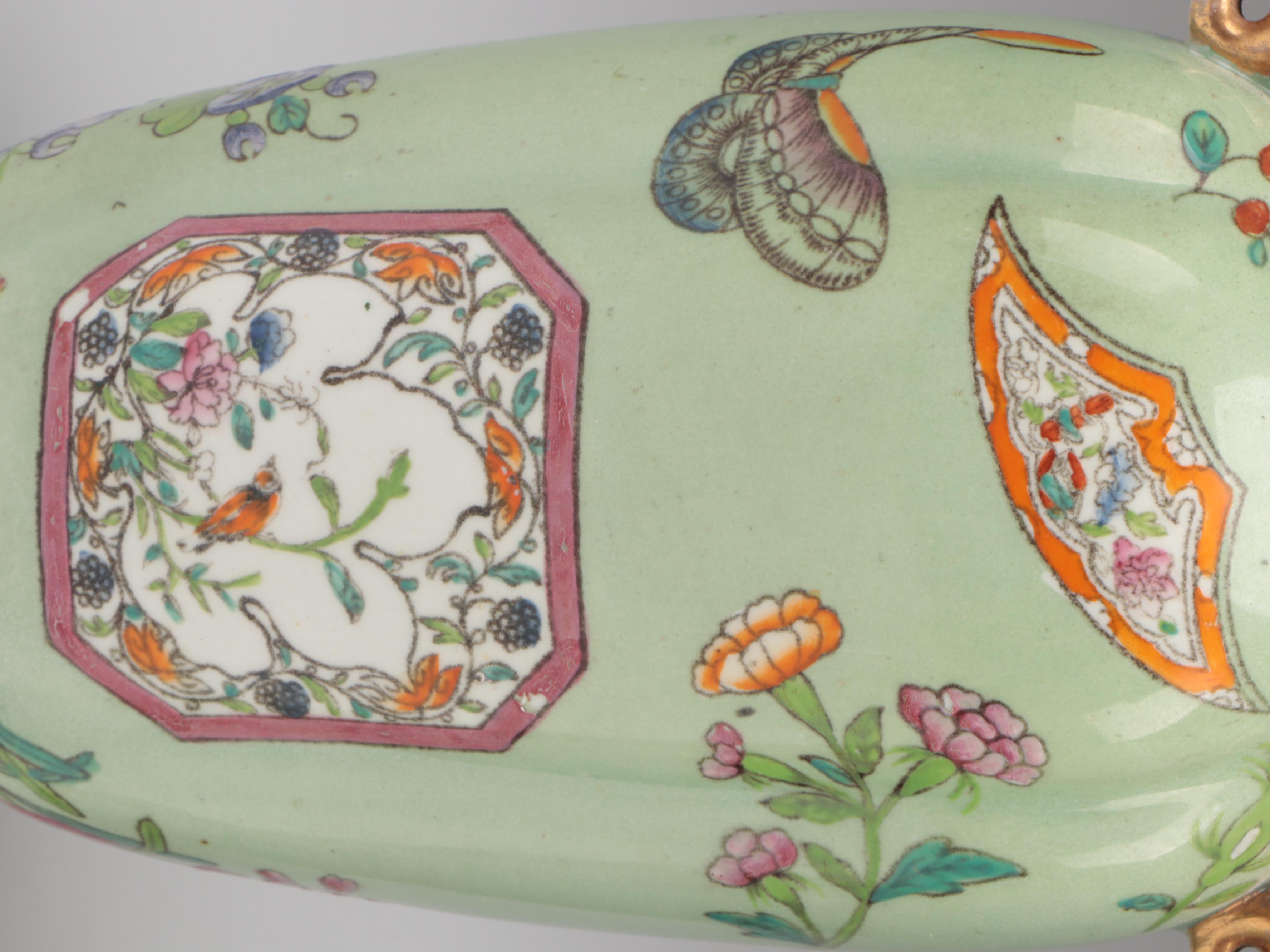 Chinese Celadon Ground Lidded Porcelain Vases with Guardian Lion Finials