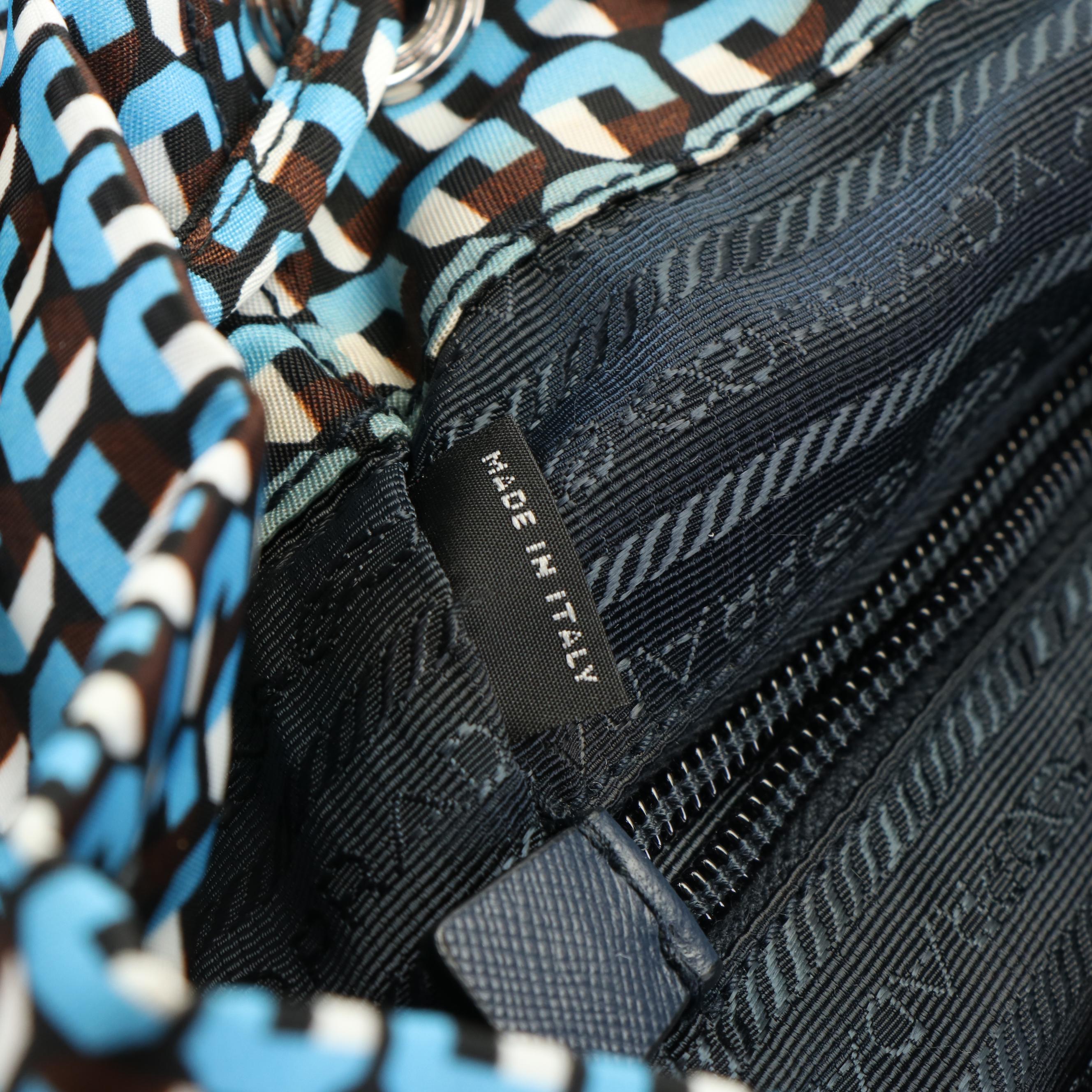 Prada  Geometric Print Tessuto Nylon Drawstring Front Zip Backpack