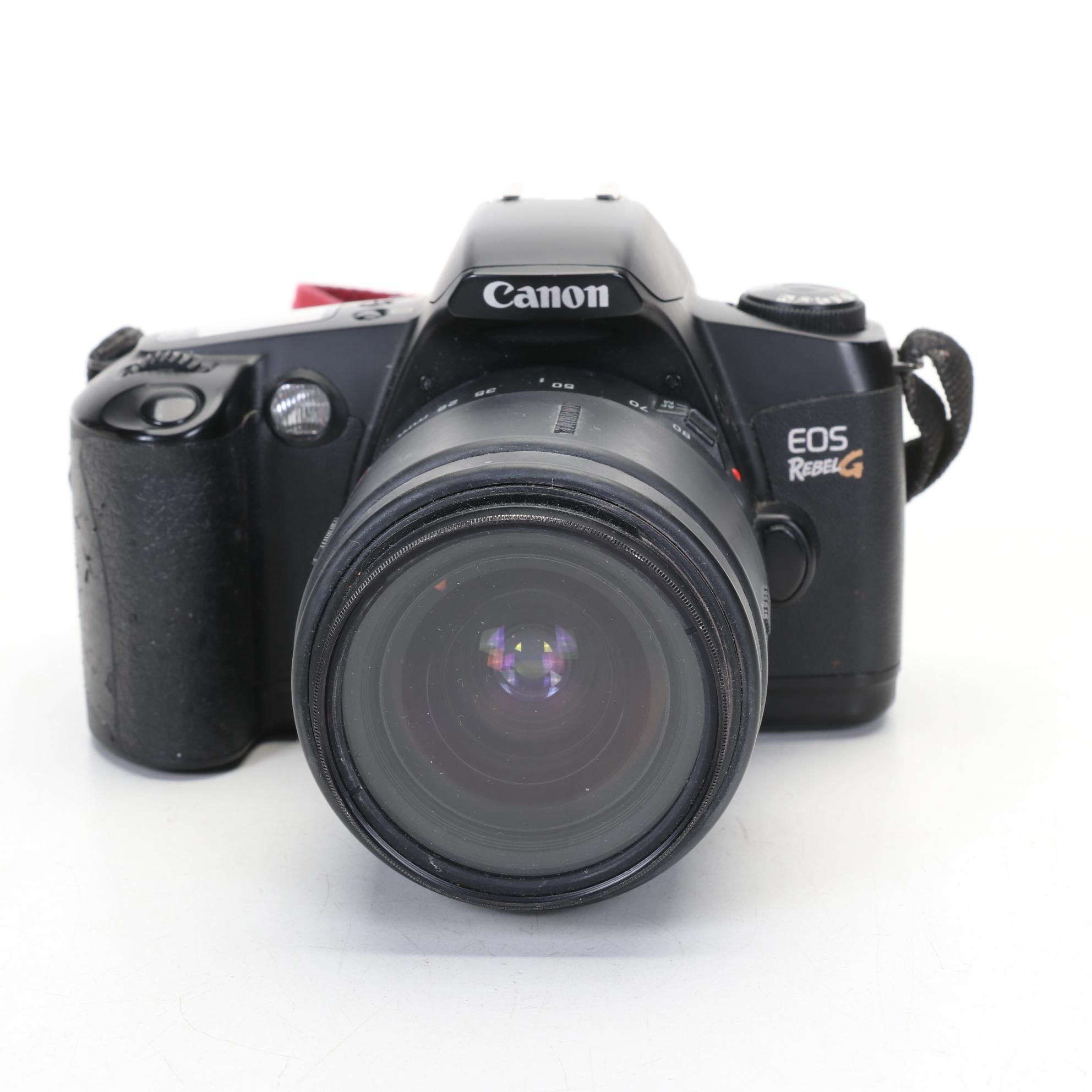 Canon EOS Rebel G Film Camera with Two Lenses and Digital Pocket Cameras