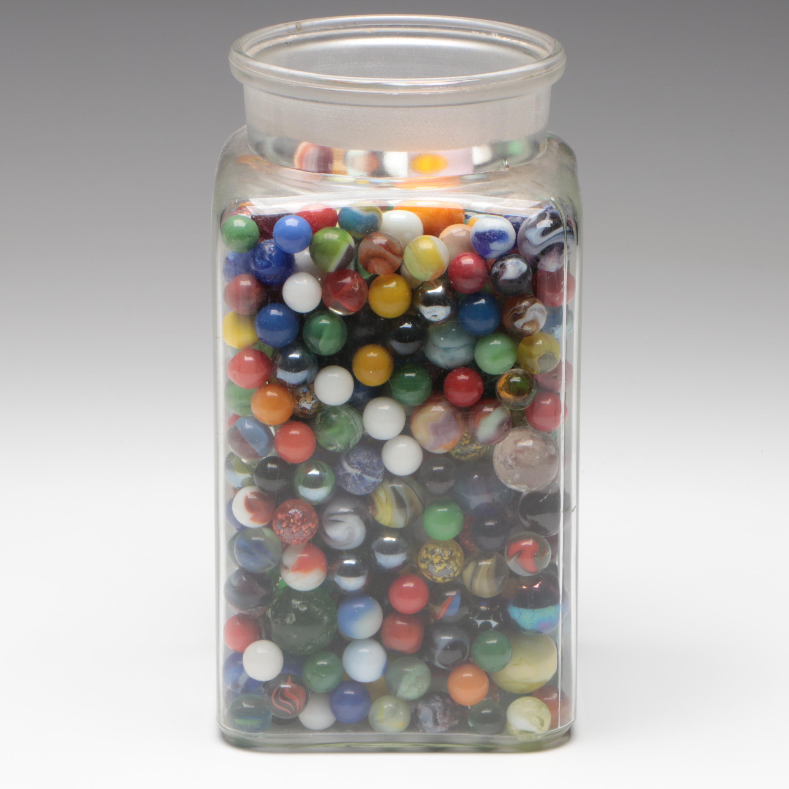 Marbles in Glass Jar Including Uranium Glass, Cork, Handmade and Other Marbles