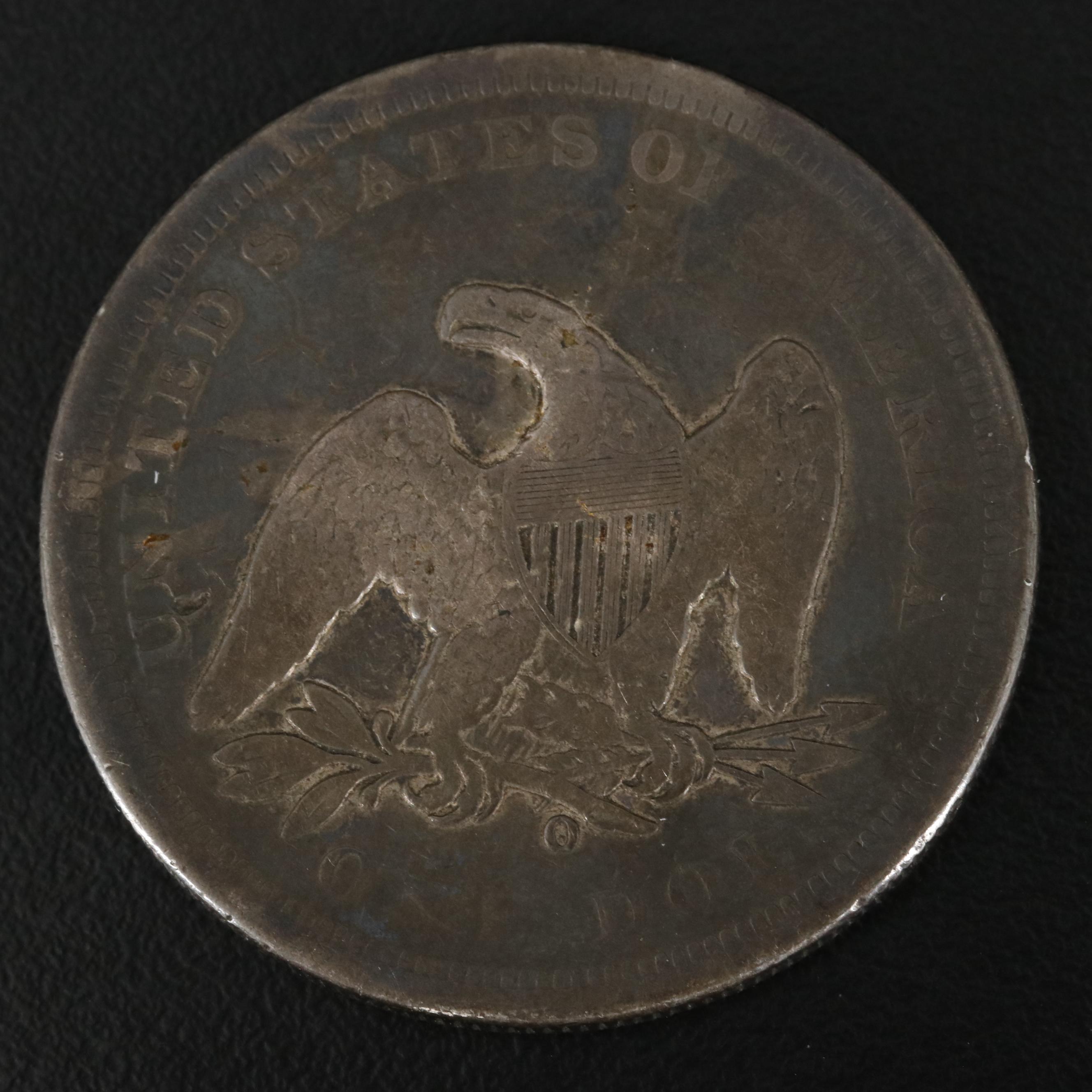1860-O Seated Liberty Silver Dollar