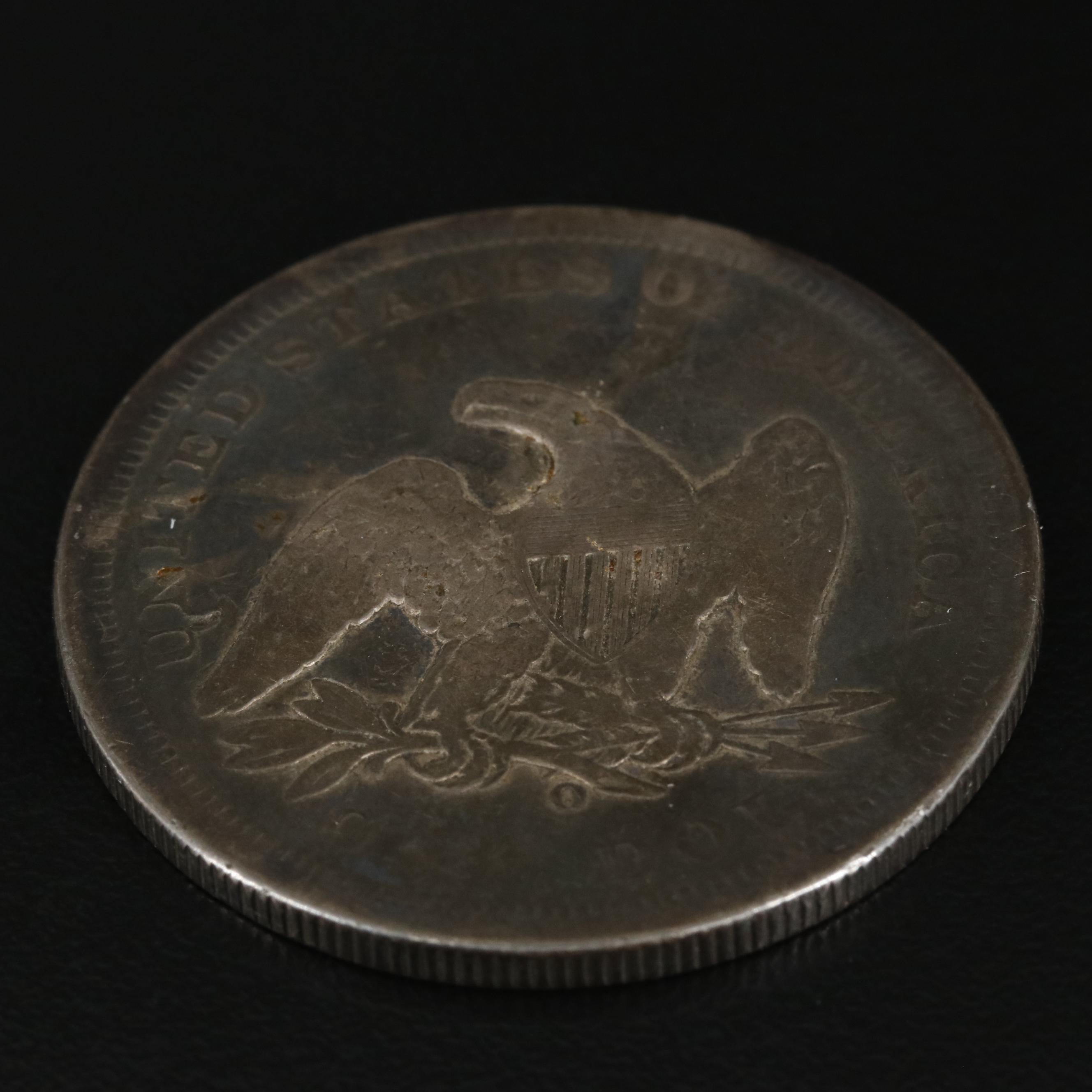 1860-O Seated Liberty Silver Dollar