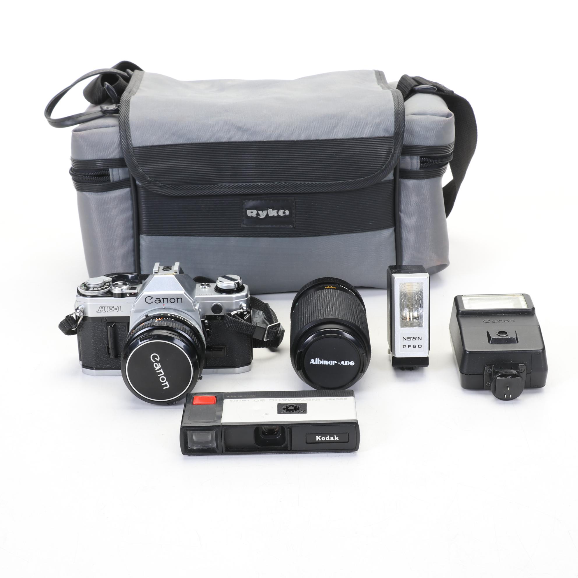 Canon AE-1 Camera Body with Lens, Albinar-ADG Lens and Kodak Instamatic Camera