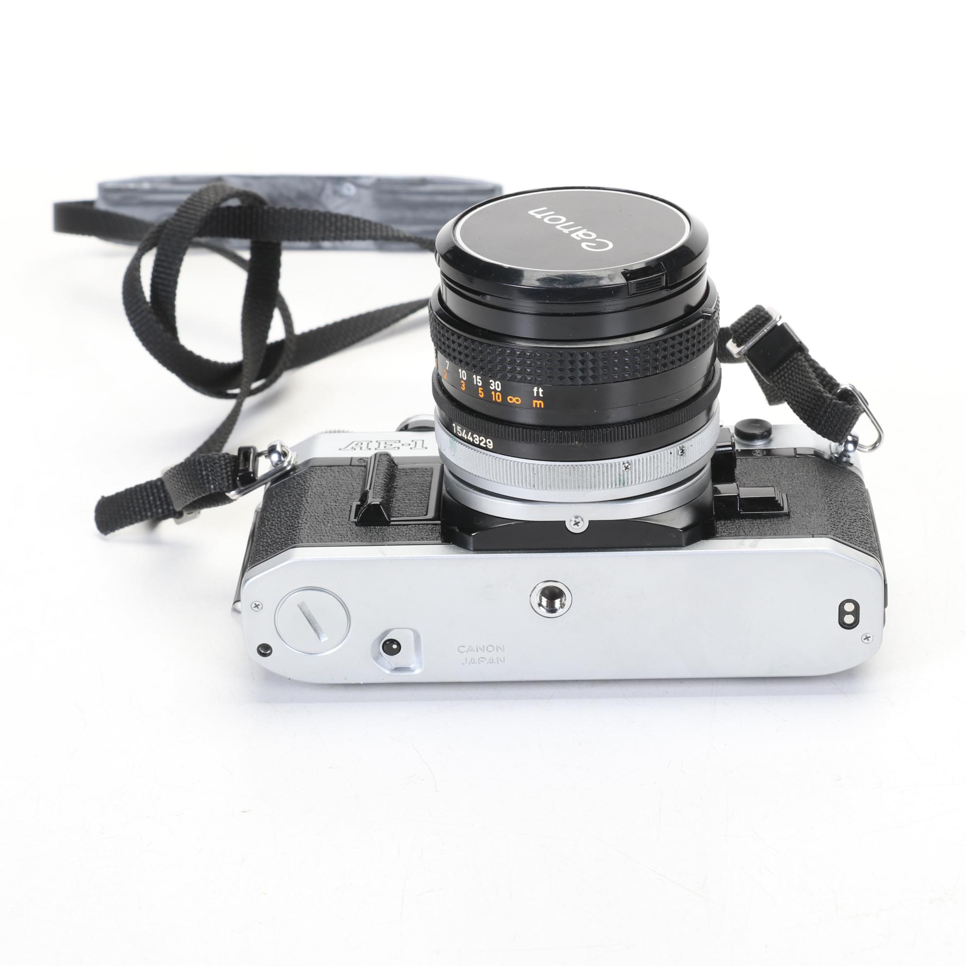 Canon AE-1 Camera Body with Lens, Albinar-ADG Lens and Kodak Instamatic Camera