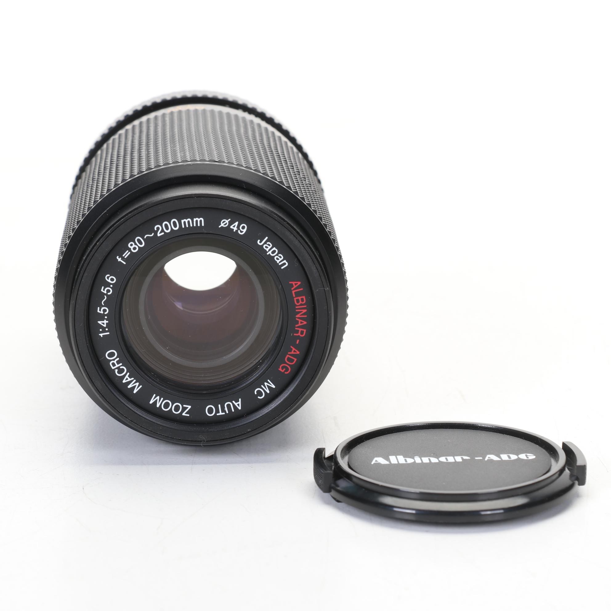 Canon AE-1 Camera Body with Lens, Albinar-ADG Lens and Kodak Instamatic Camera