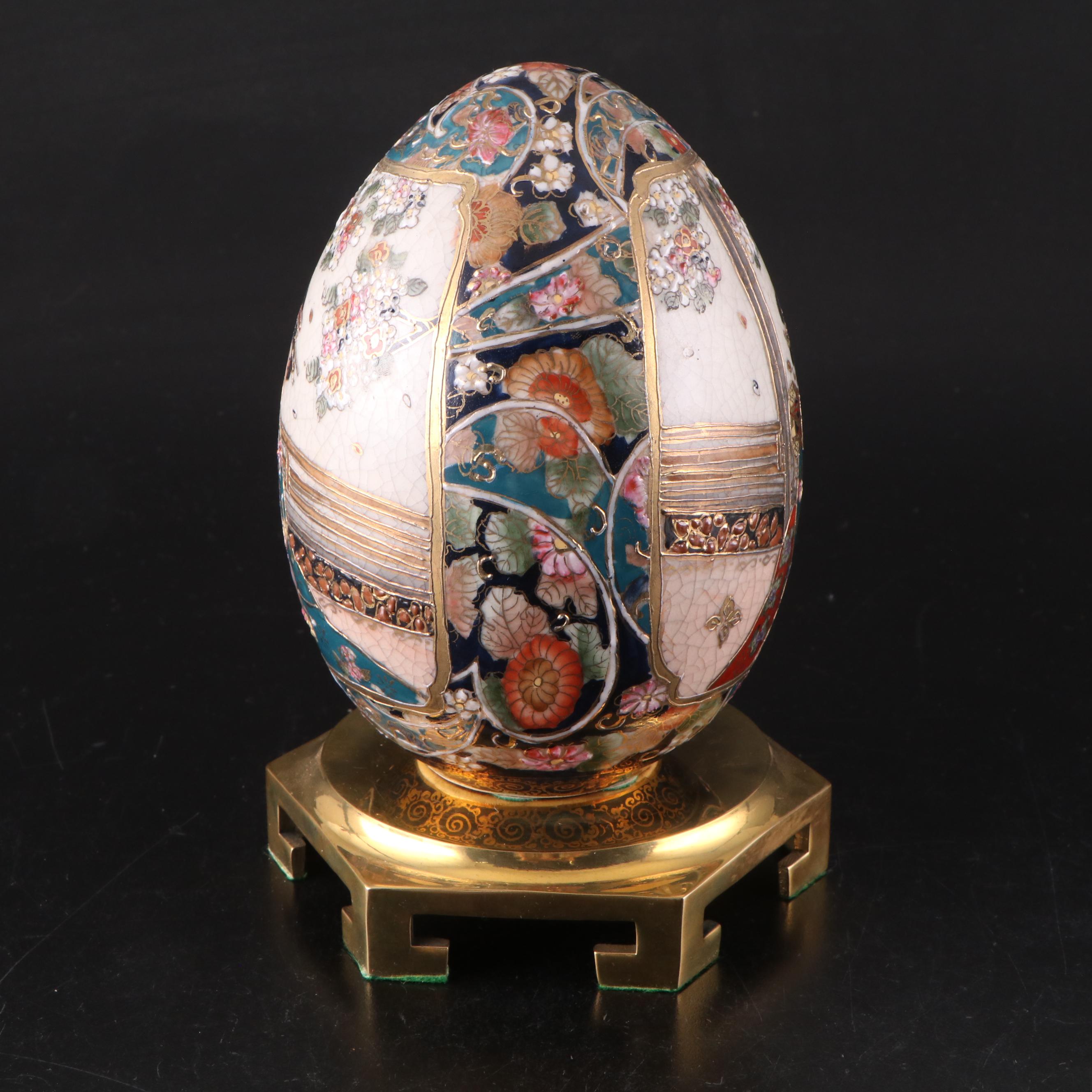 Japanese Satsuma Style Porcelain Egg with Brass Stand and Faceted Glass Box