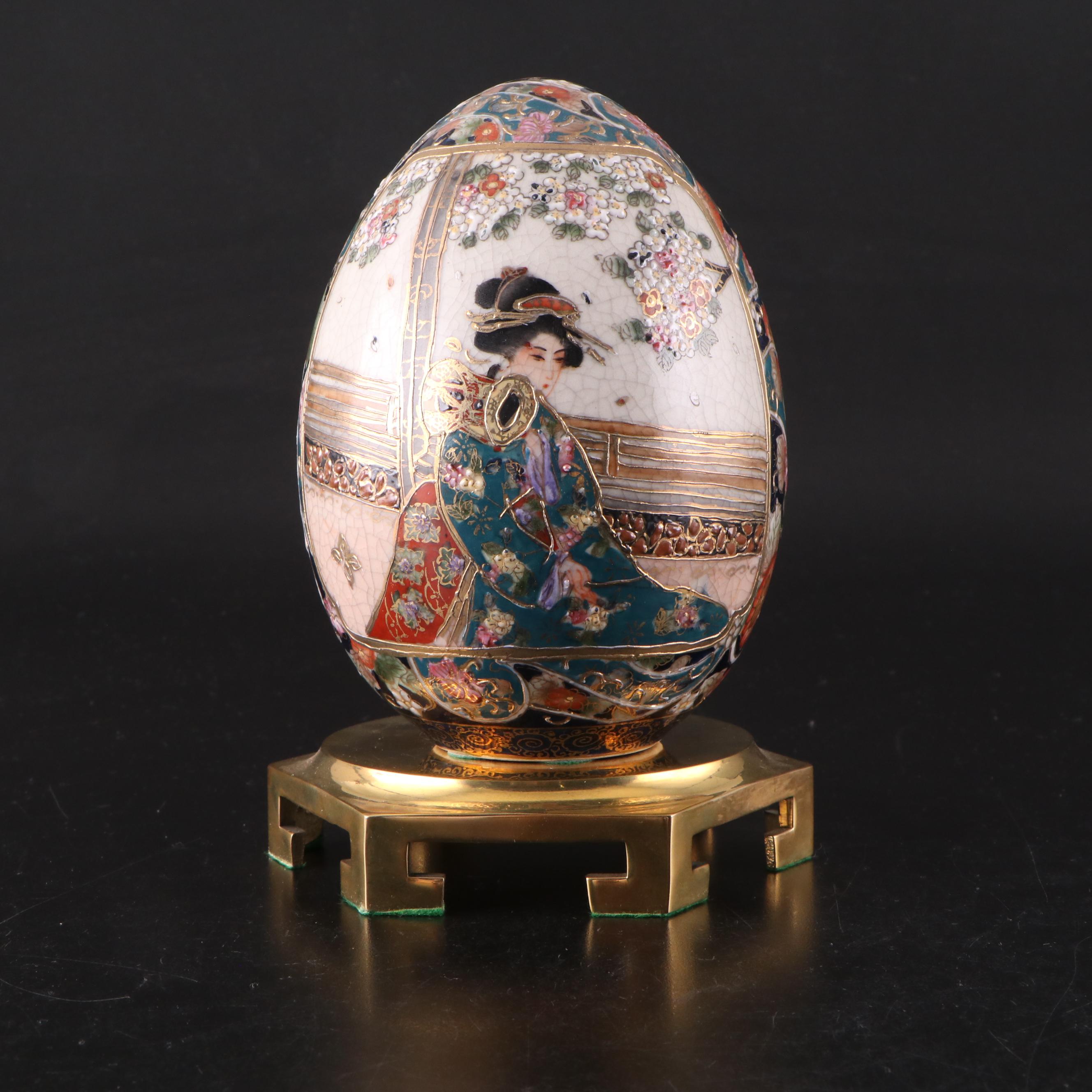 Japanese Satsuma Style Porcelain Egg with Brass Stand and Faceted Glass Box