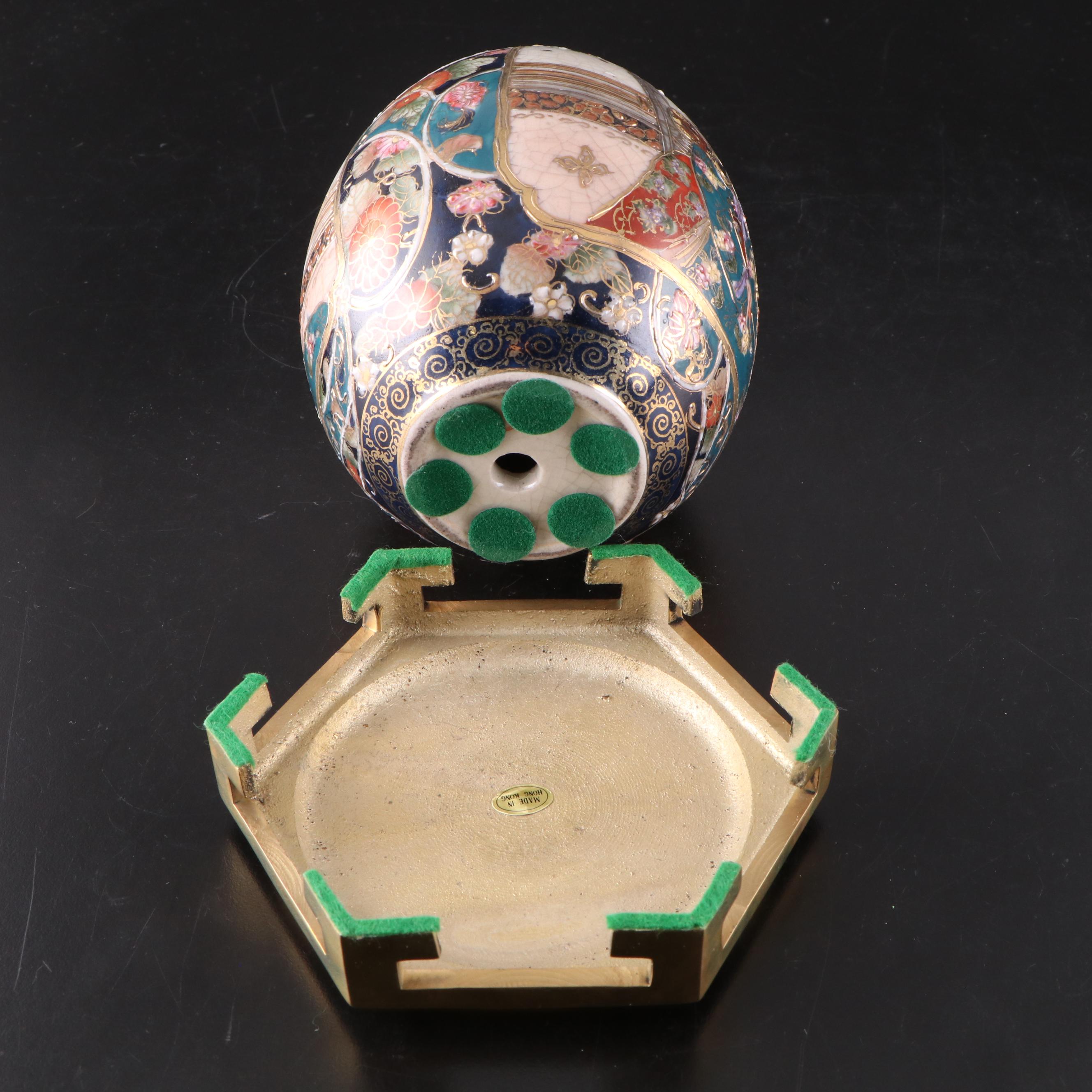 Japanese Satsuma Style Porcelain Egg with Brass Stand and Faceted Glass Box