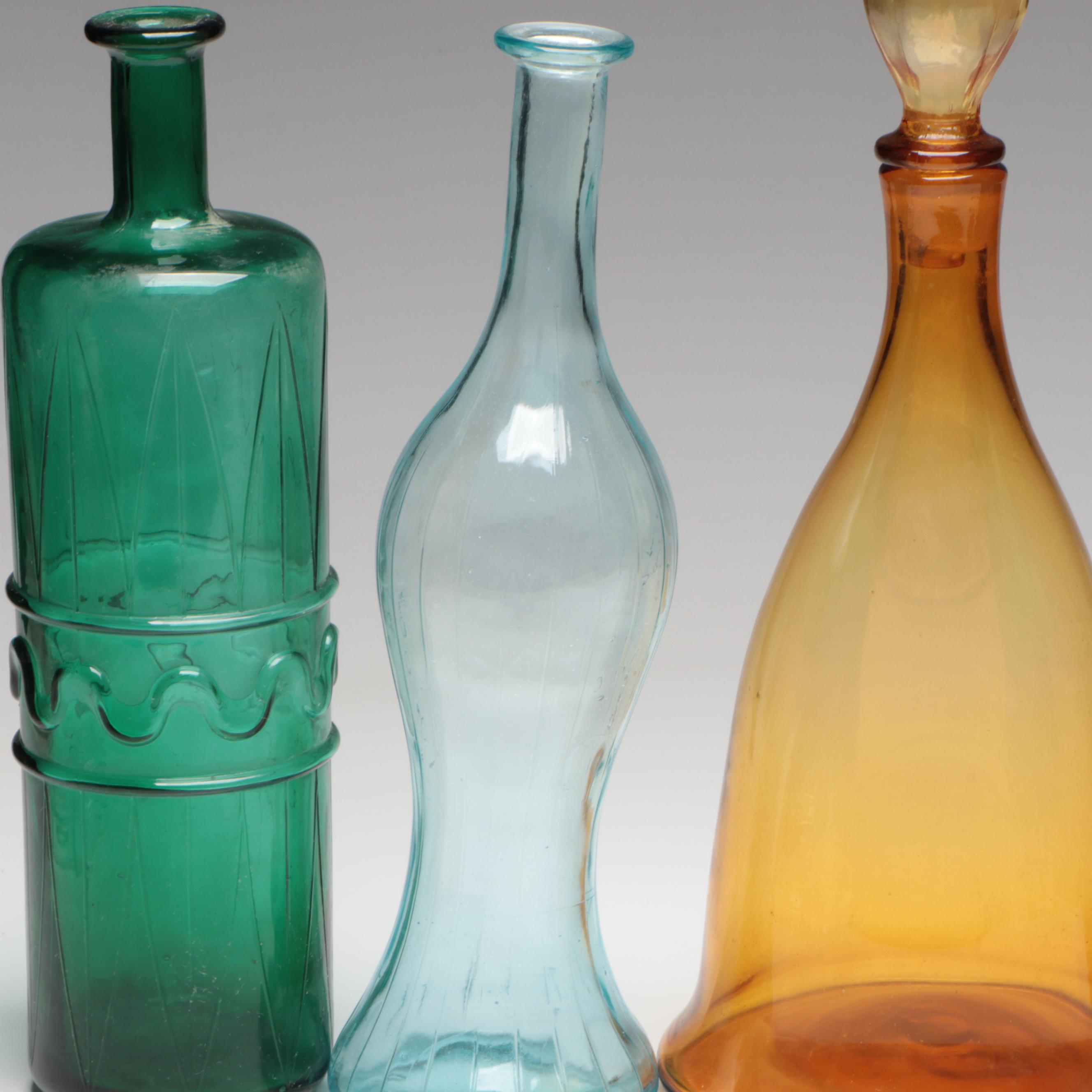Amber Glass Decanter with Other Bottle Vases
