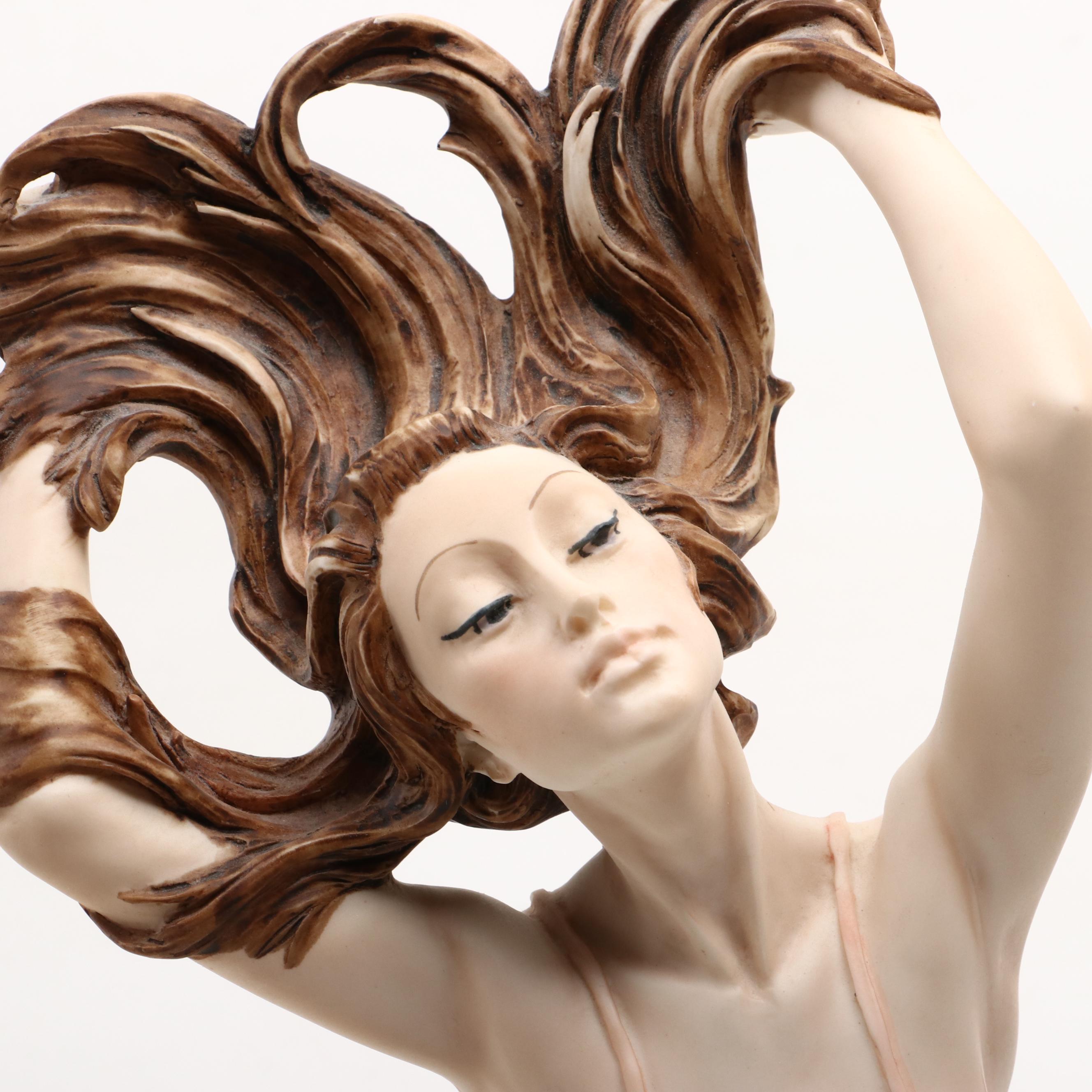 A. Santini Cast Resin Figurine of Seated Woman