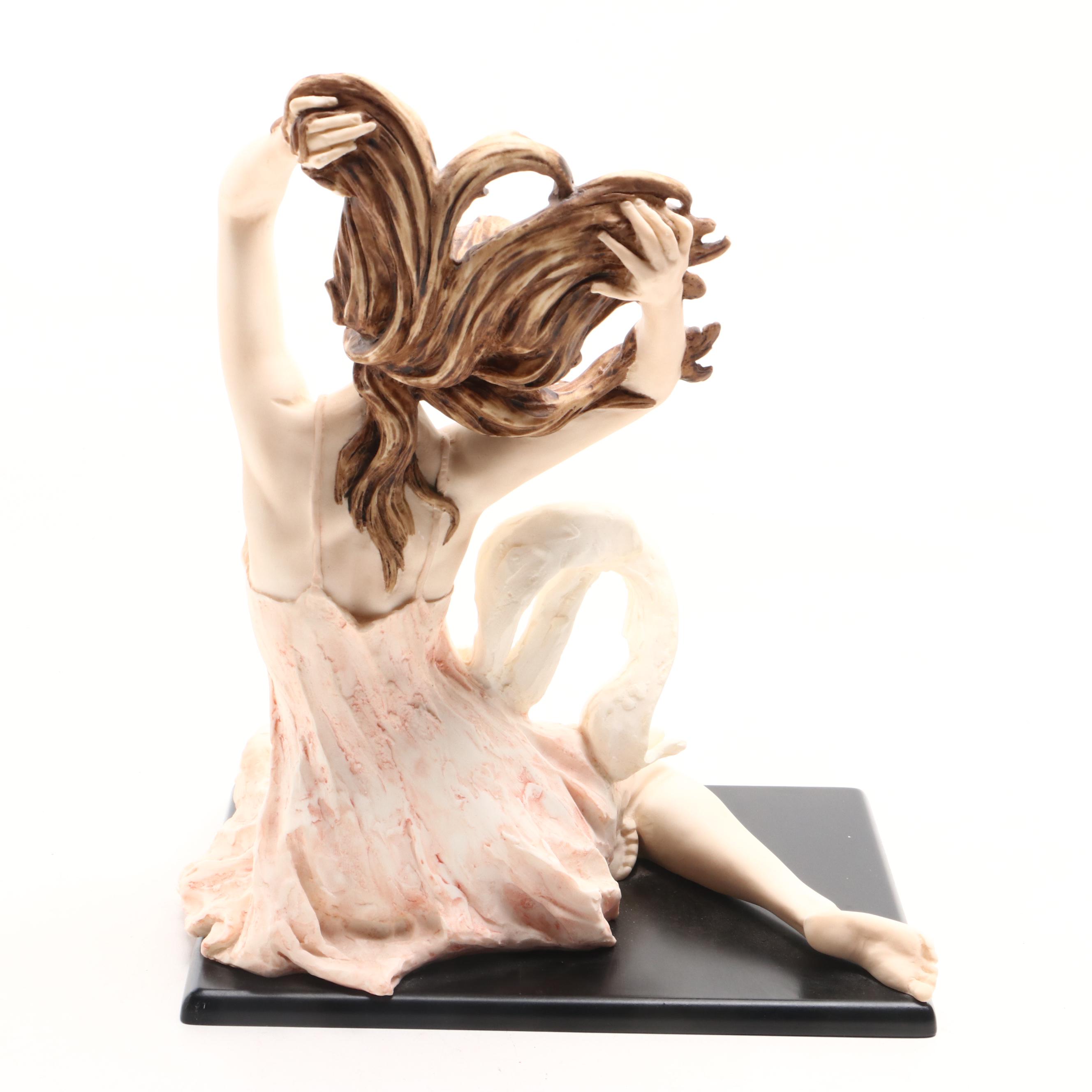 A. Santini Cast Resin Figurine of Seated Woman