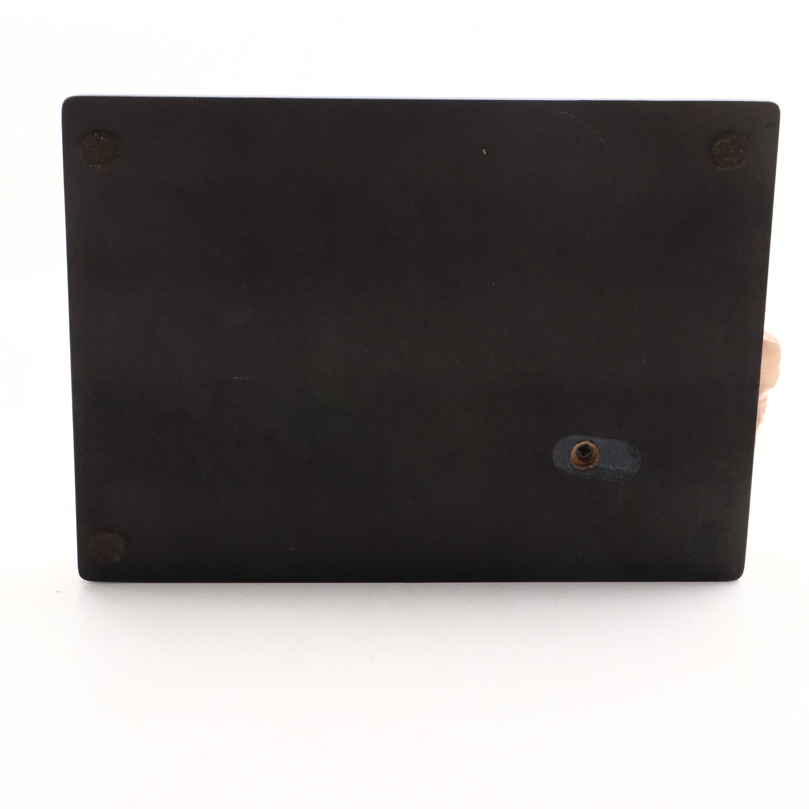 A. Santini Cast Resin Figurine of Seated Woman