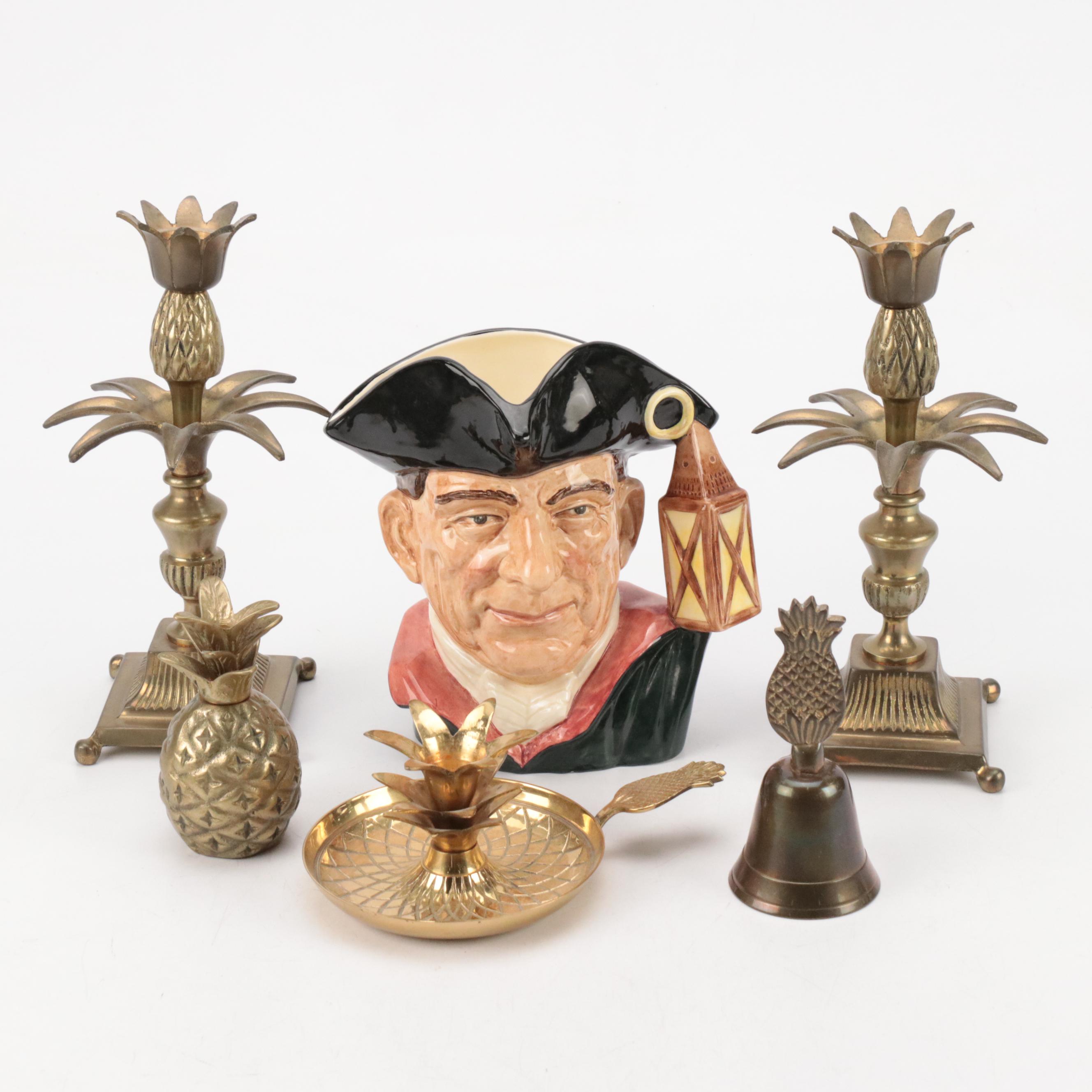 Pineapple-Form Candlesticks and Bells With "Night Watchmen" Character Mug