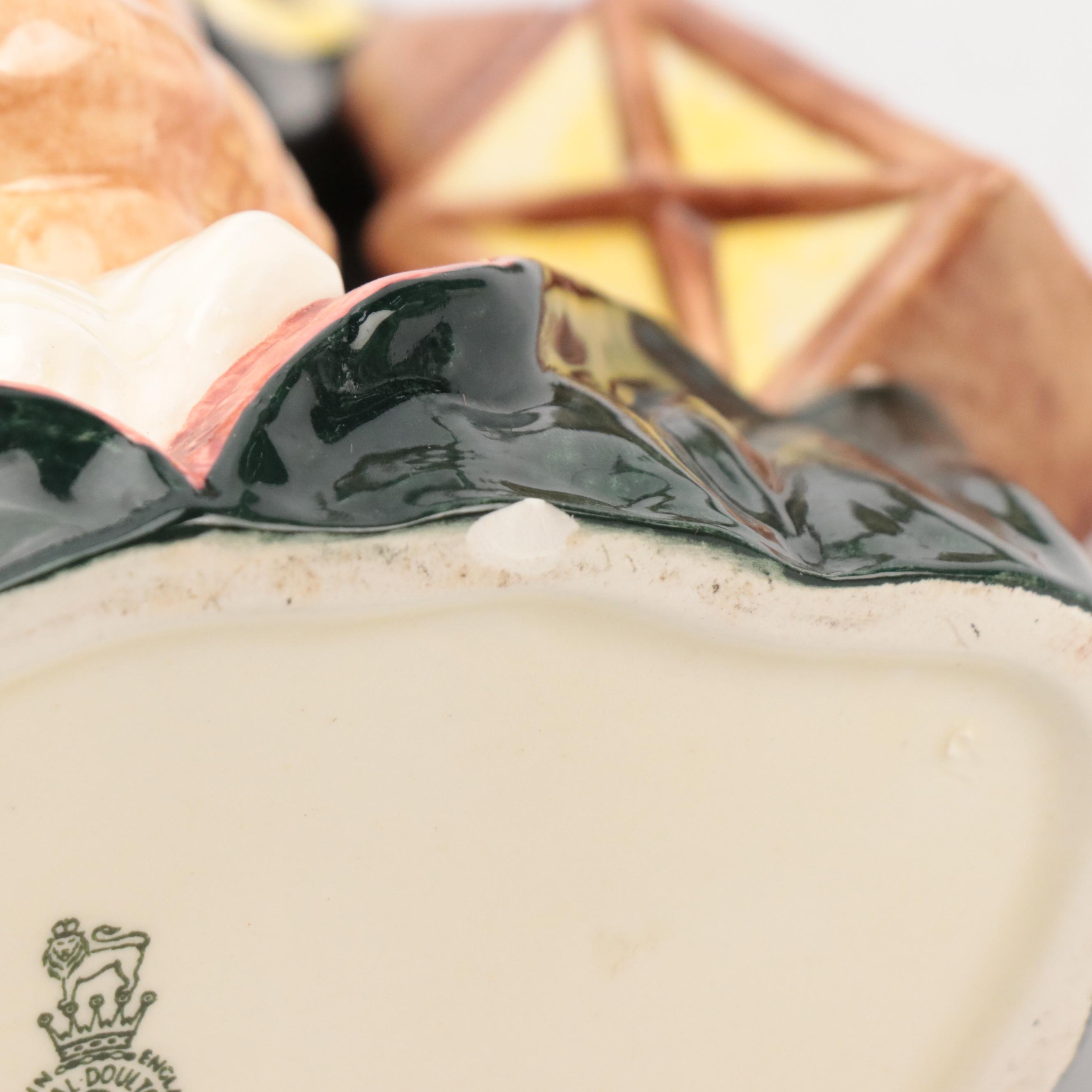 Pineapple-Form Candlesticks and Bells With "Night Watchmen" Character Mug