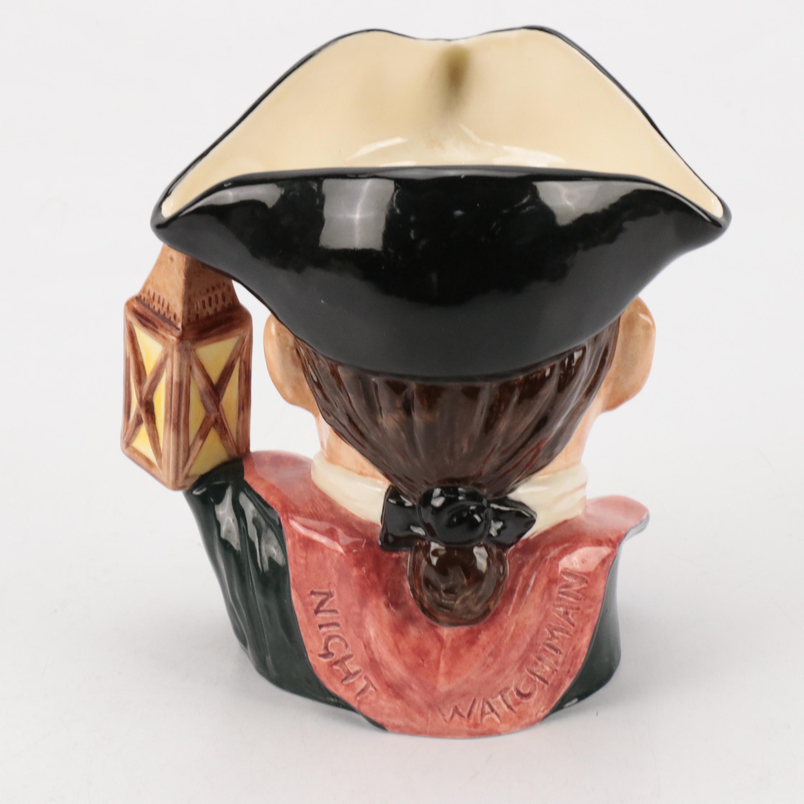 Pineapple-Form Candlesticks and Bells With "Night Watchmen" Character Mug