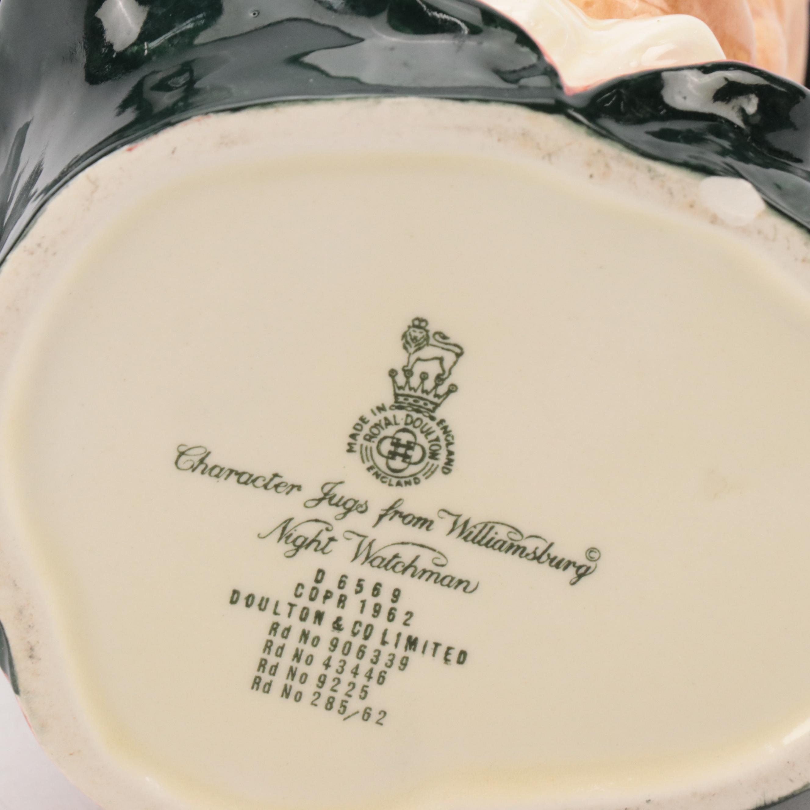 Pineapple-Form Candlesticks and Bells With "Night Watchmen" Character Mug