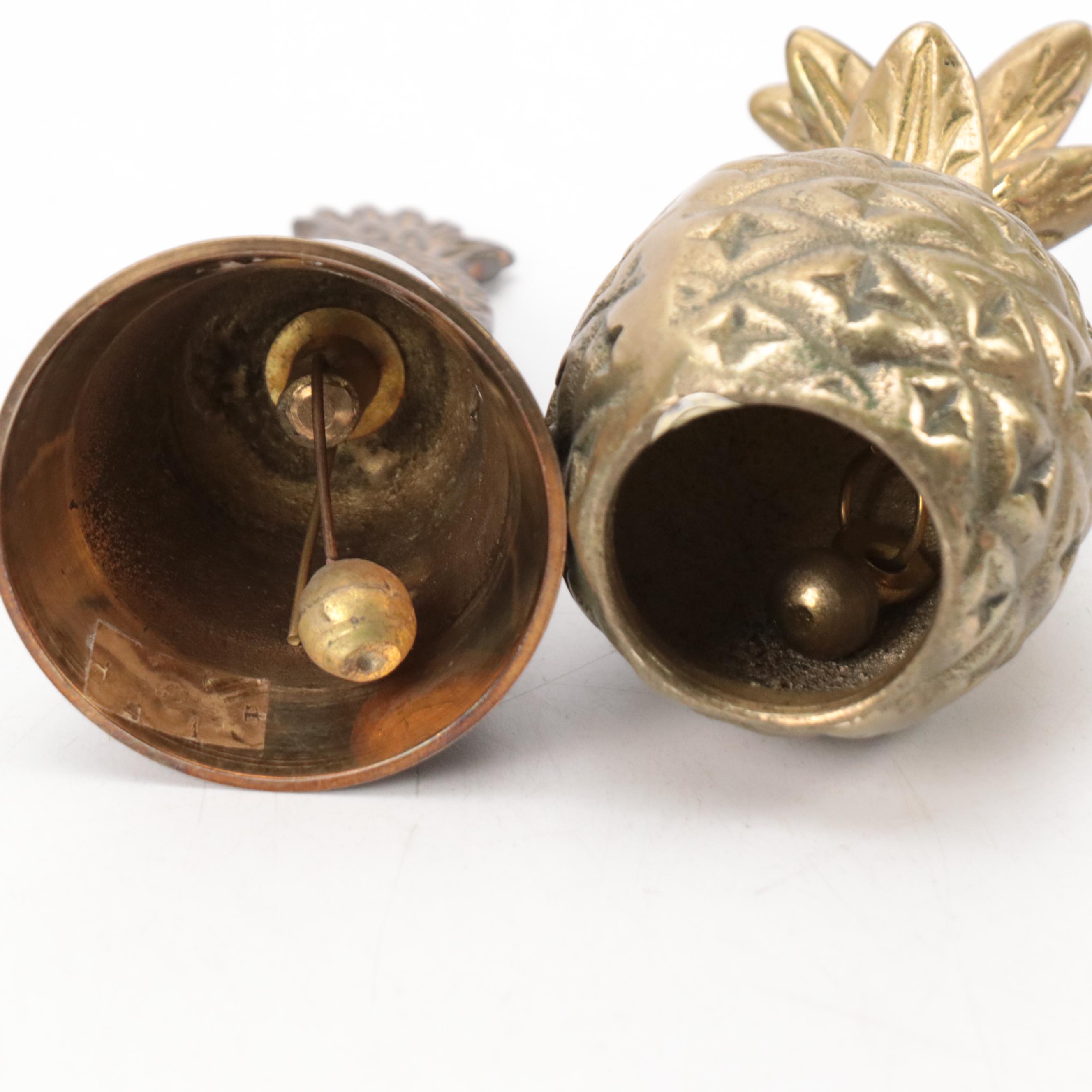 Pineapple-Form Candlesticks and Bells With "Night Watchmen" Character Mug