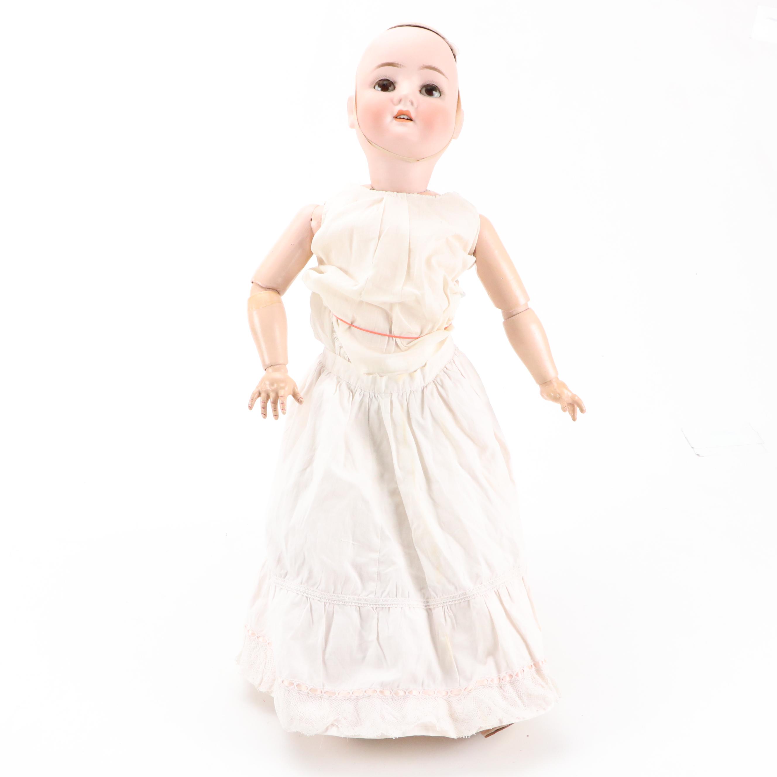 Gutmann & Schniffnie Bisque Head and Composition Body Doll, Early 20th