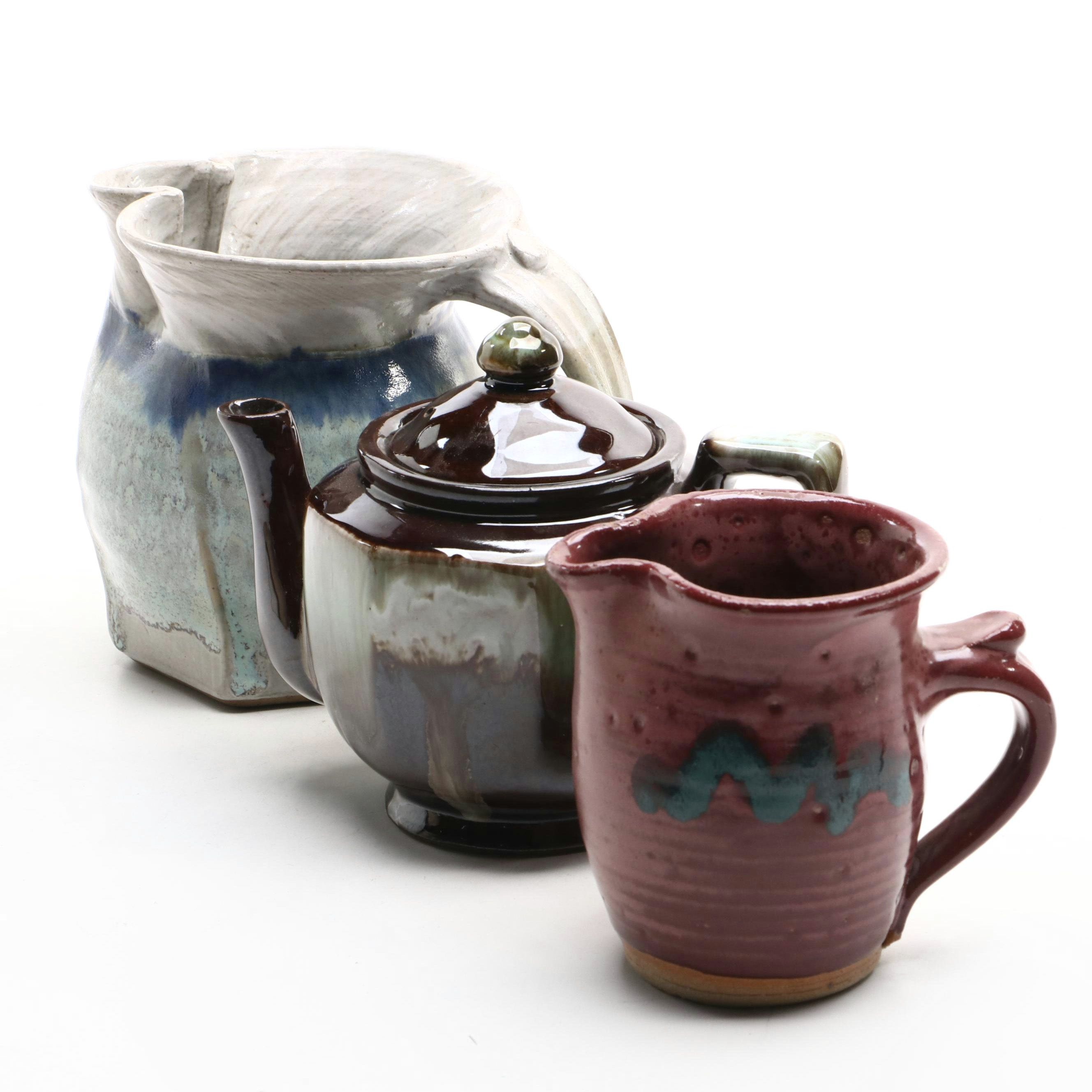 Drip Glazed Teapot with Other Art Pottery Pitchers
