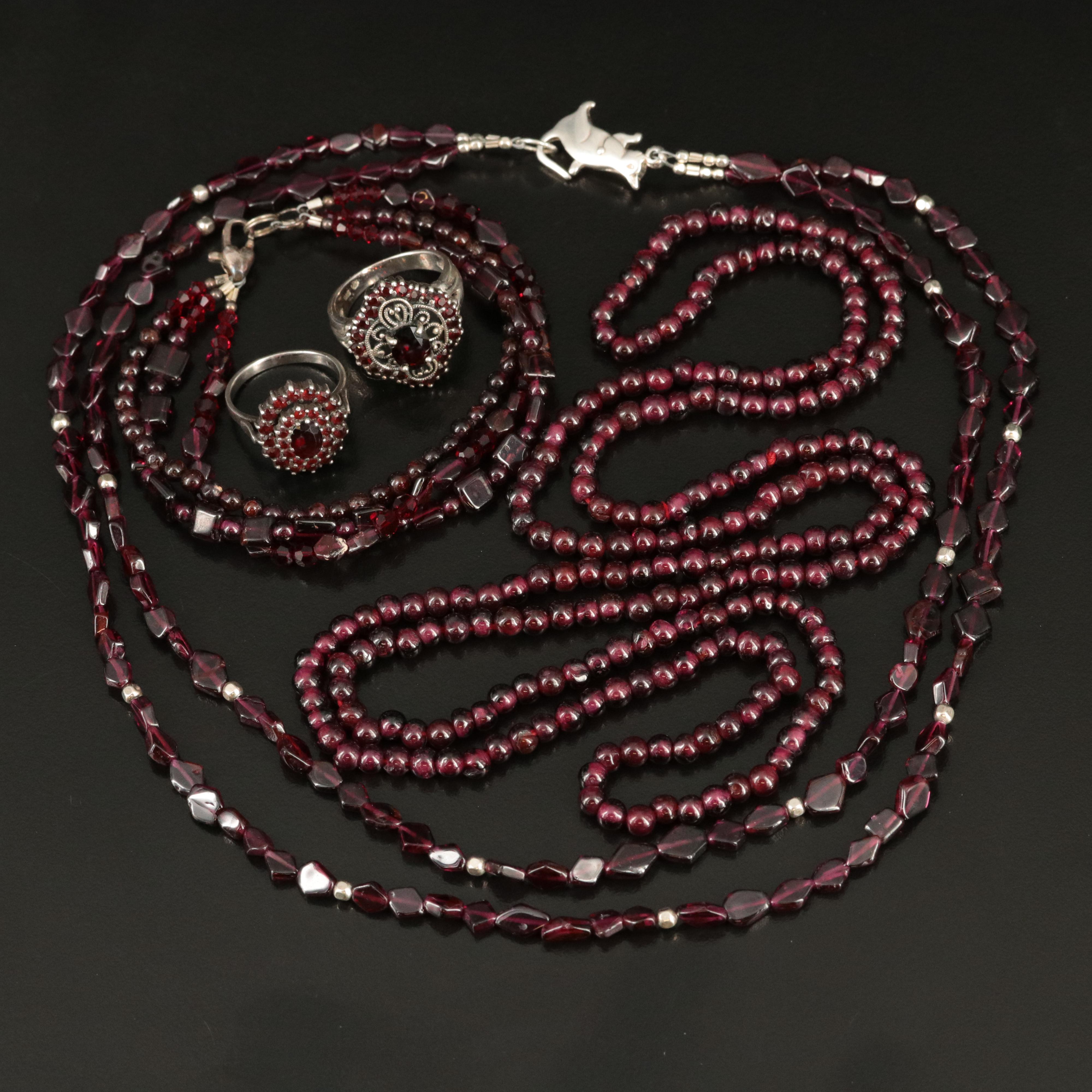 Sterling Garnet Collection Featuring Necklaces, Rings and Bracelet
