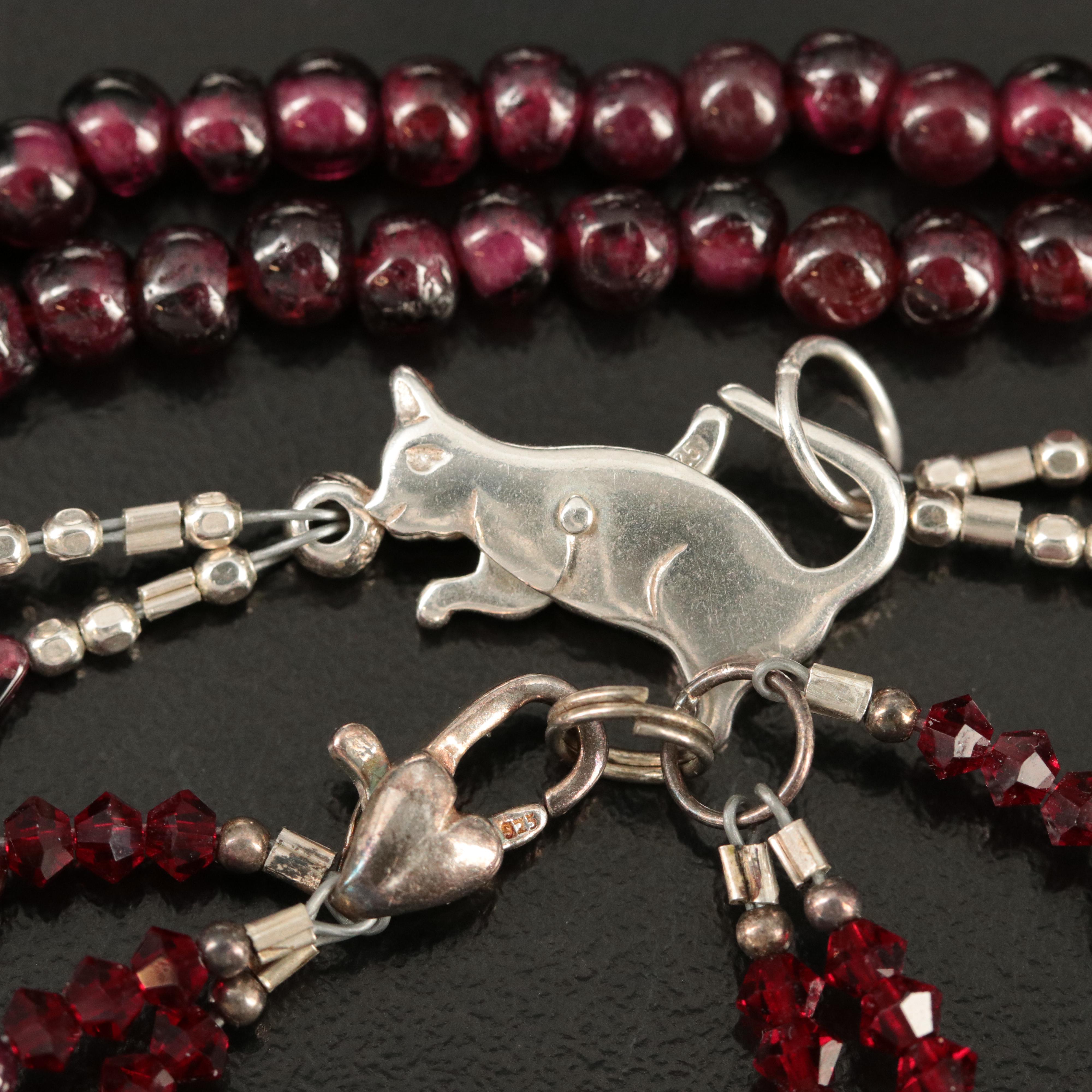 Sterling Garnet Collection Featuring Necklaces, Rings and Bracelet
