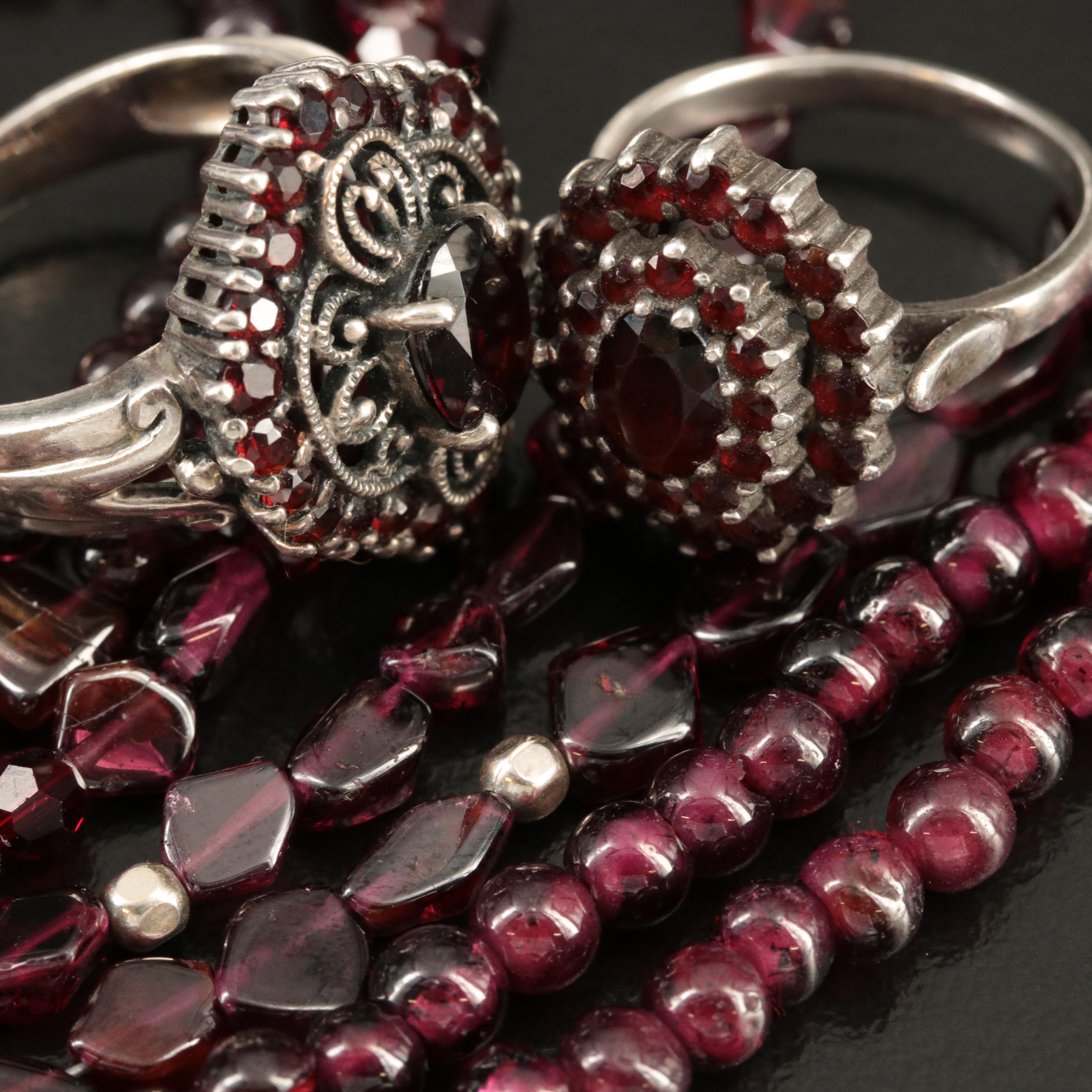 Sterling Garnet Collection Featuring Necklaces, Rings and Bracelet