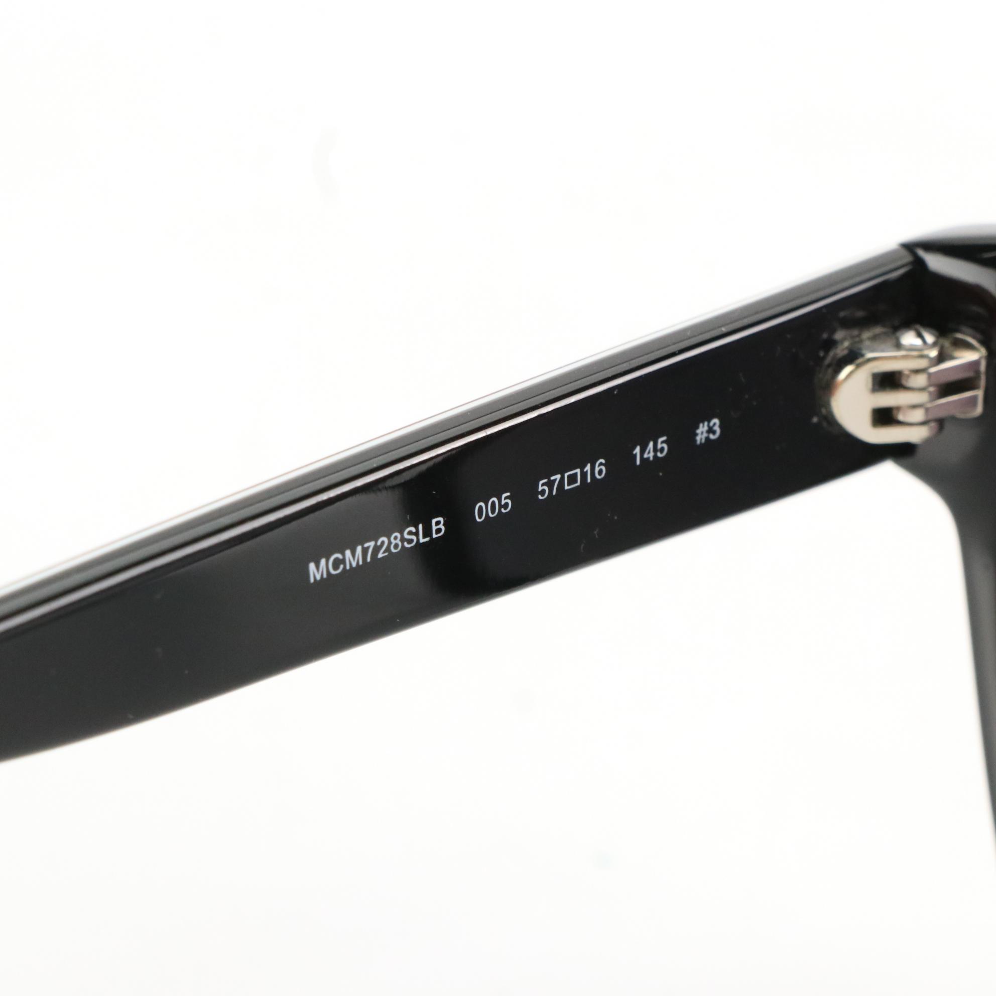 MCM 728SLB 005 Black Wayfarer Sunglasses with Tinted Jawns Case