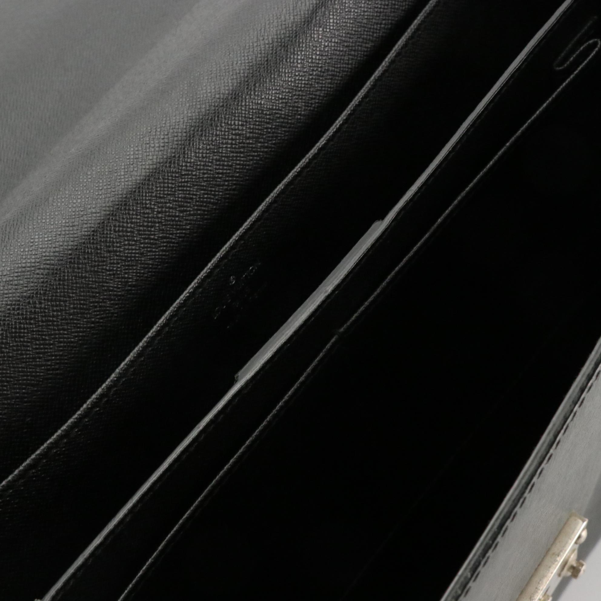 Louis Vuitton Serviette Kourad Briefcase in Black Taiga Leather