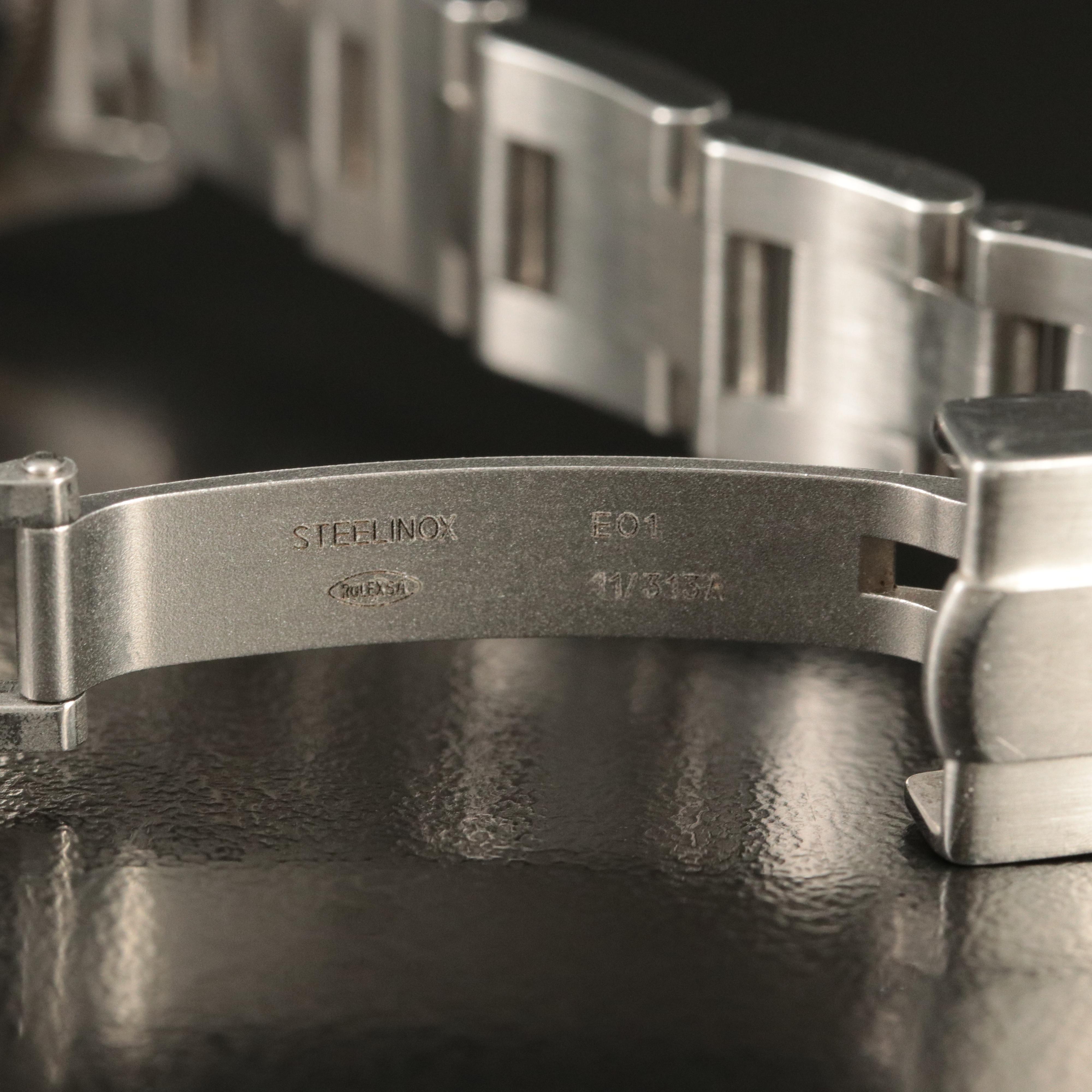 2007 Rolex Oyster Perpetual Salmon Dial Stainless Steel Watch