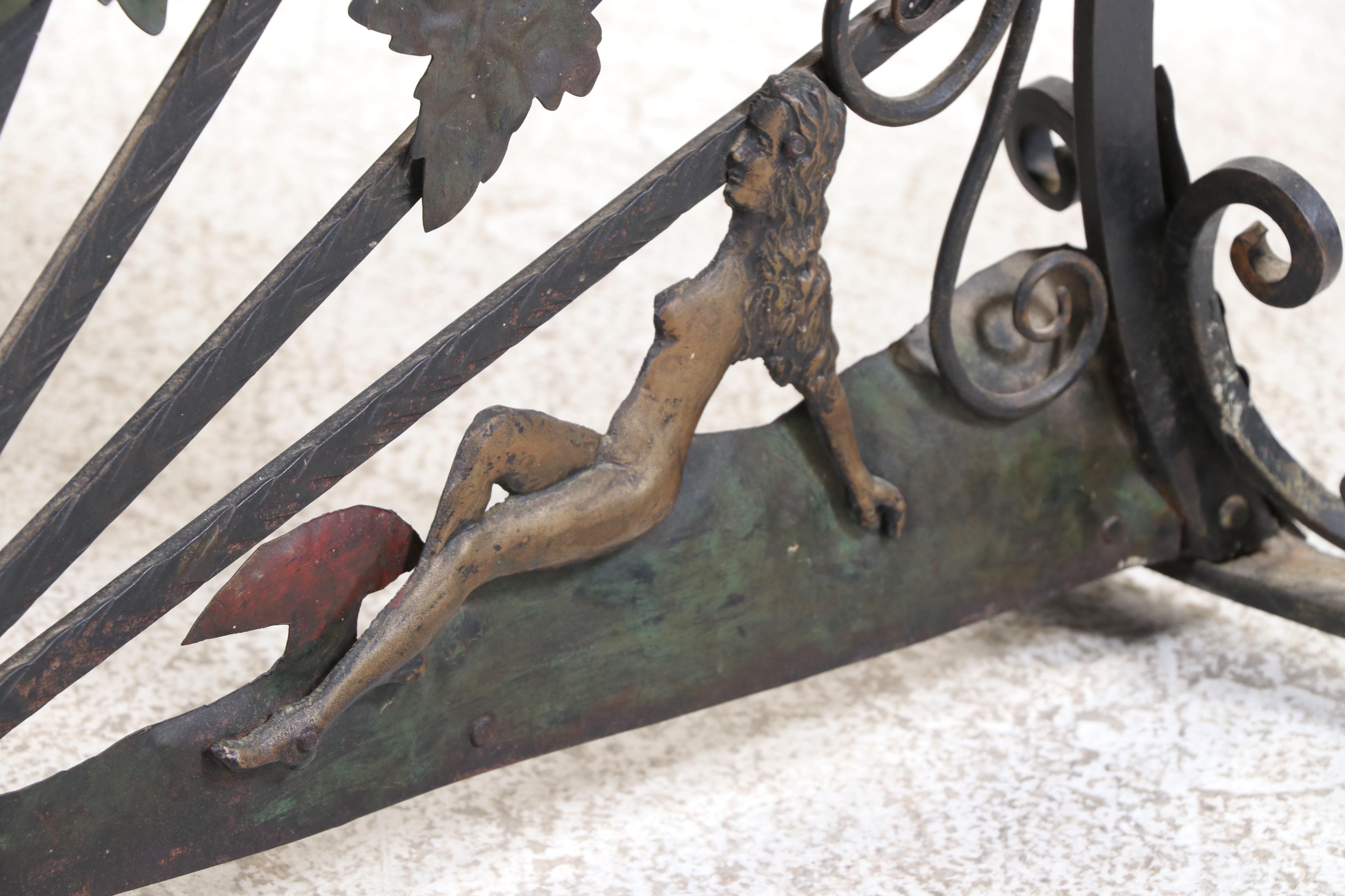Pair of Bacchanalian Motif Wrought Iron Fireplace Fender Benches