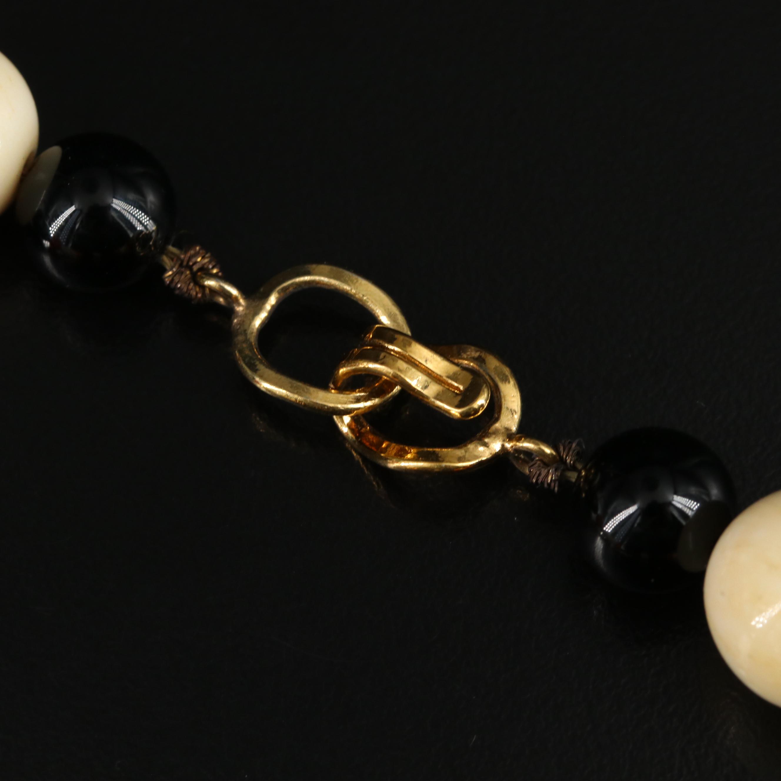 Serpentine Archer's Ring Featured in Carved Bead and Black Onyx Necklace