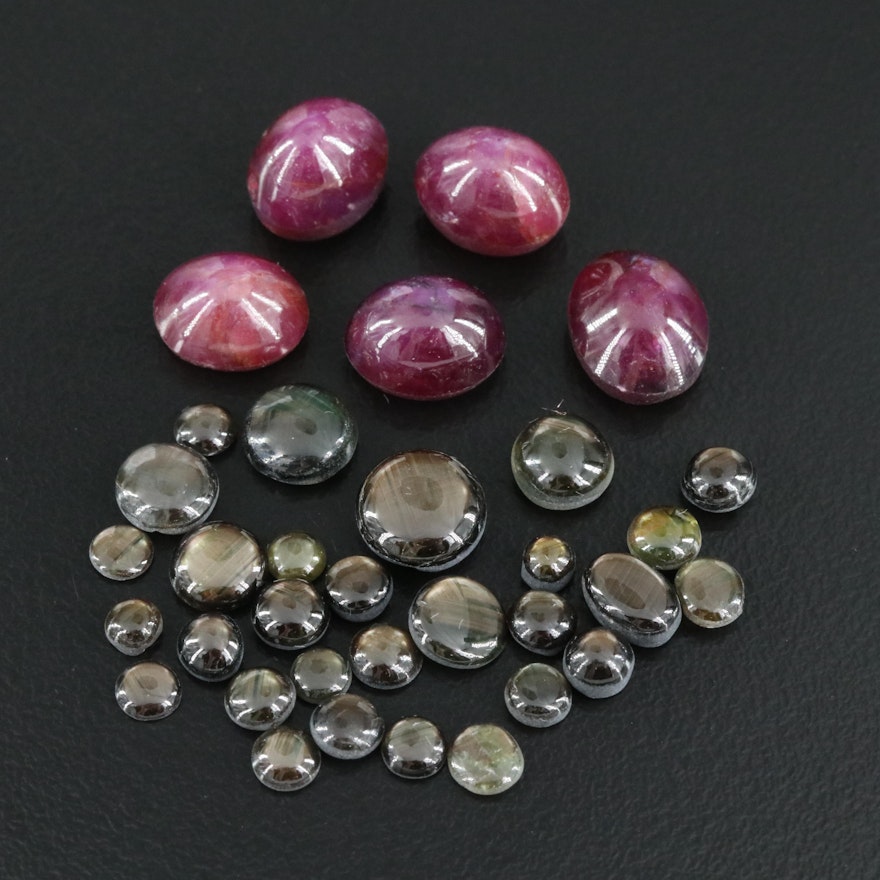 Loose 51.24 CTW Gemstones Including Star Ruby and Star Sapphire