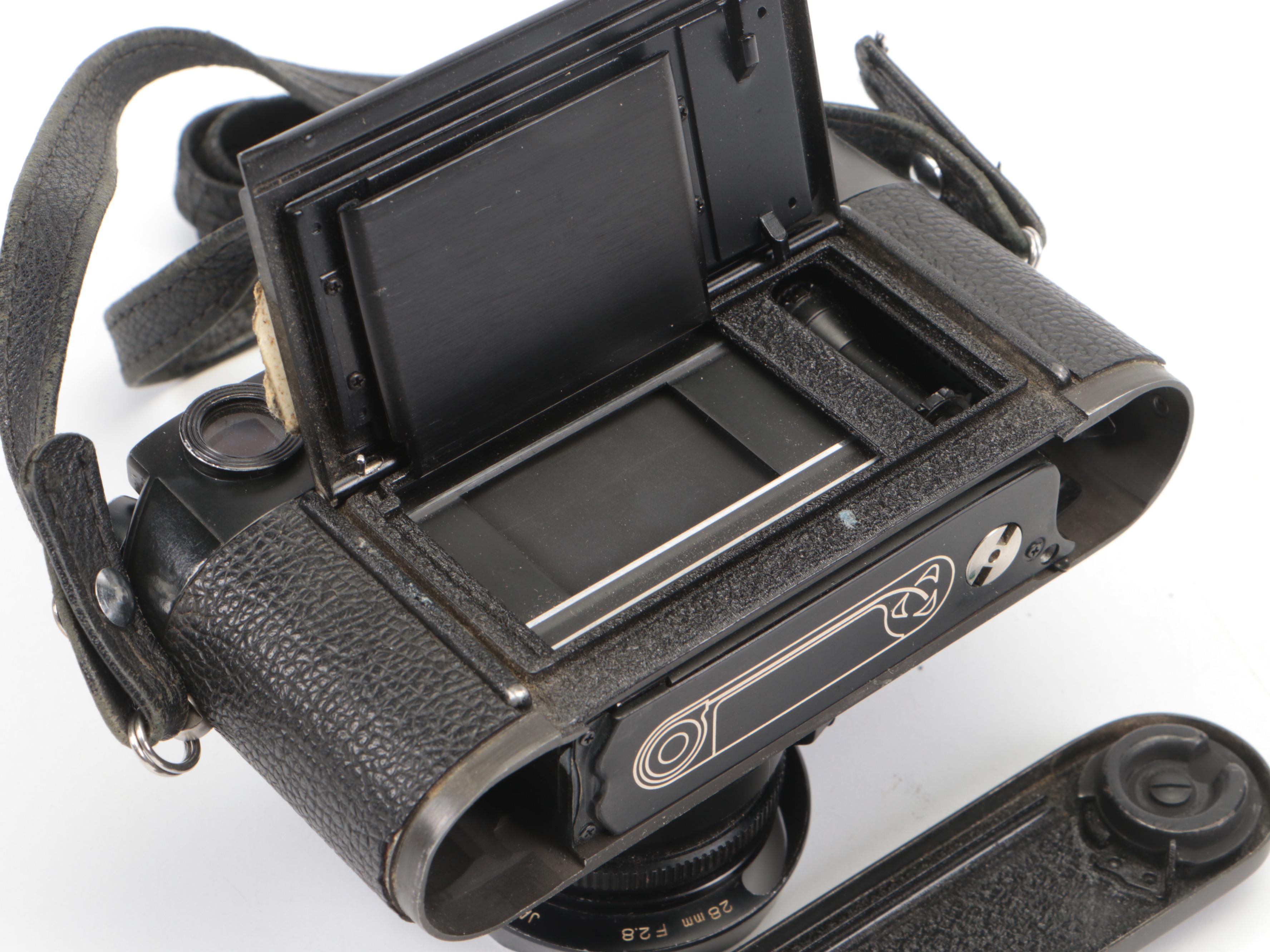 Leica M4-2 Camera with Minolta Camera Lens with More Accessories