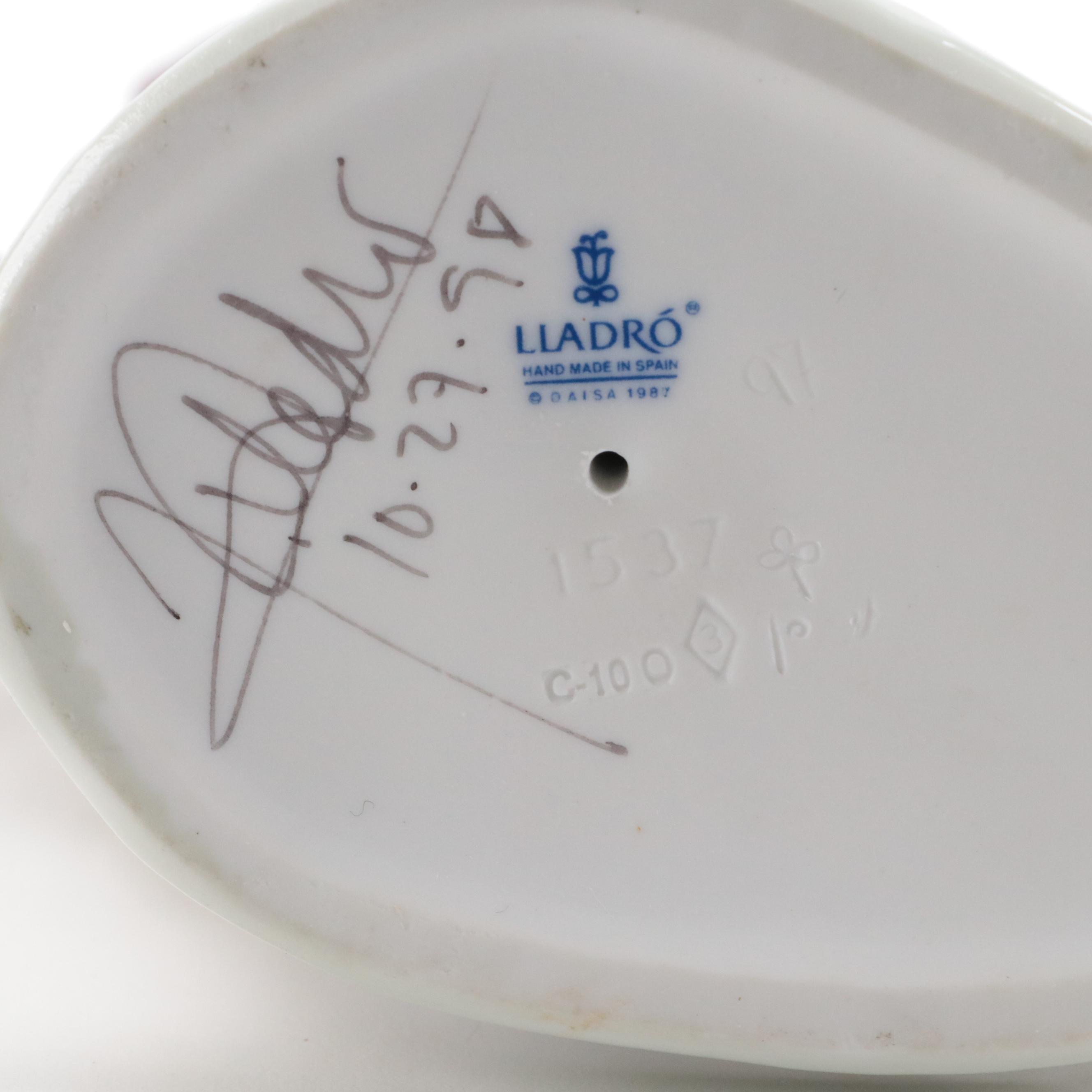 Signed Lladró "Stepping Out" Porcelain Figure