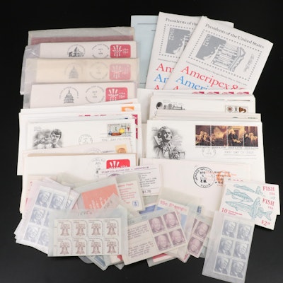 Group of First Day Covers, Postcards, and Mint Condition U.S. Postage Stamps