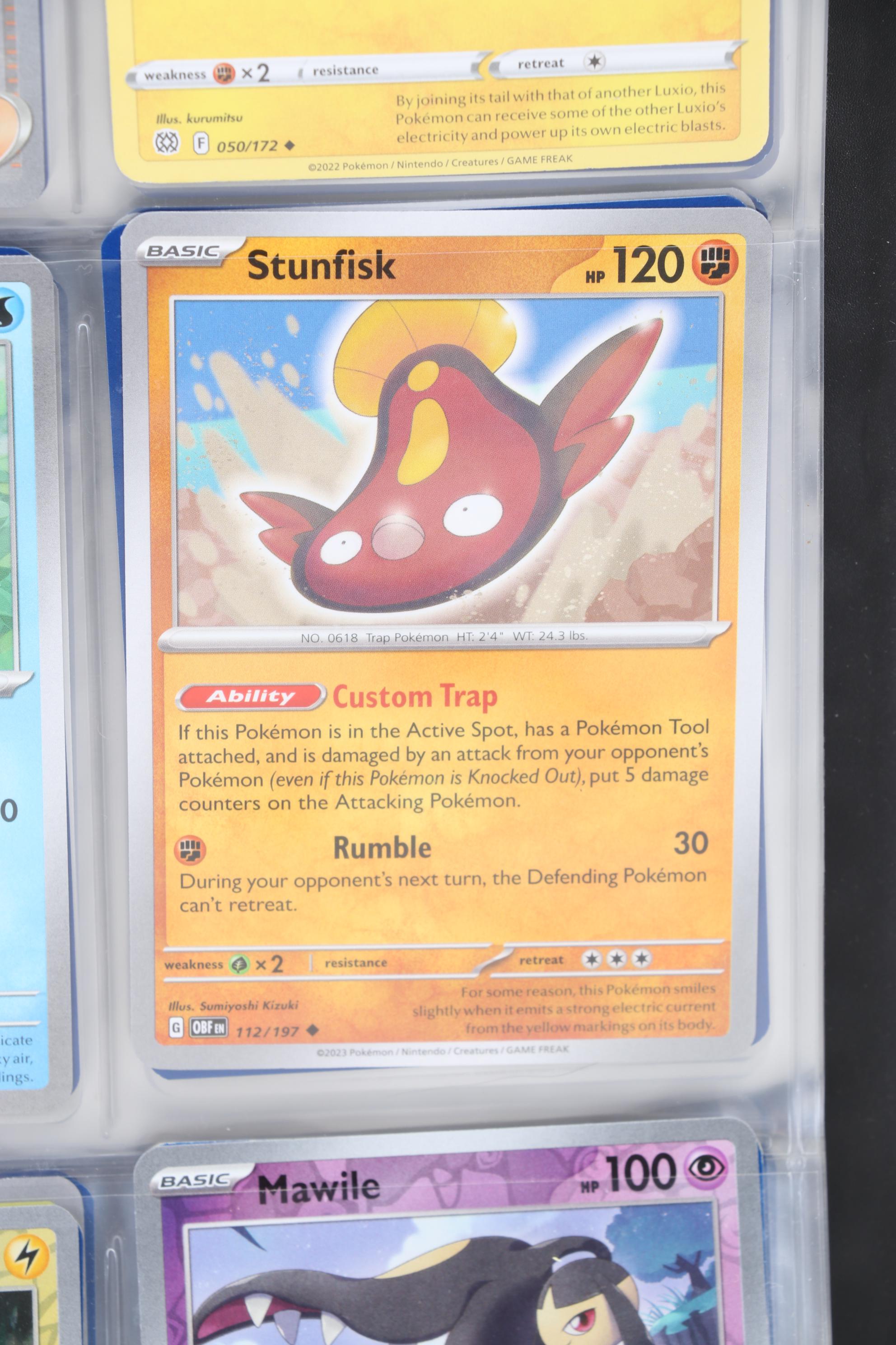 Pokémon Card Collection Featuring Holo Cards