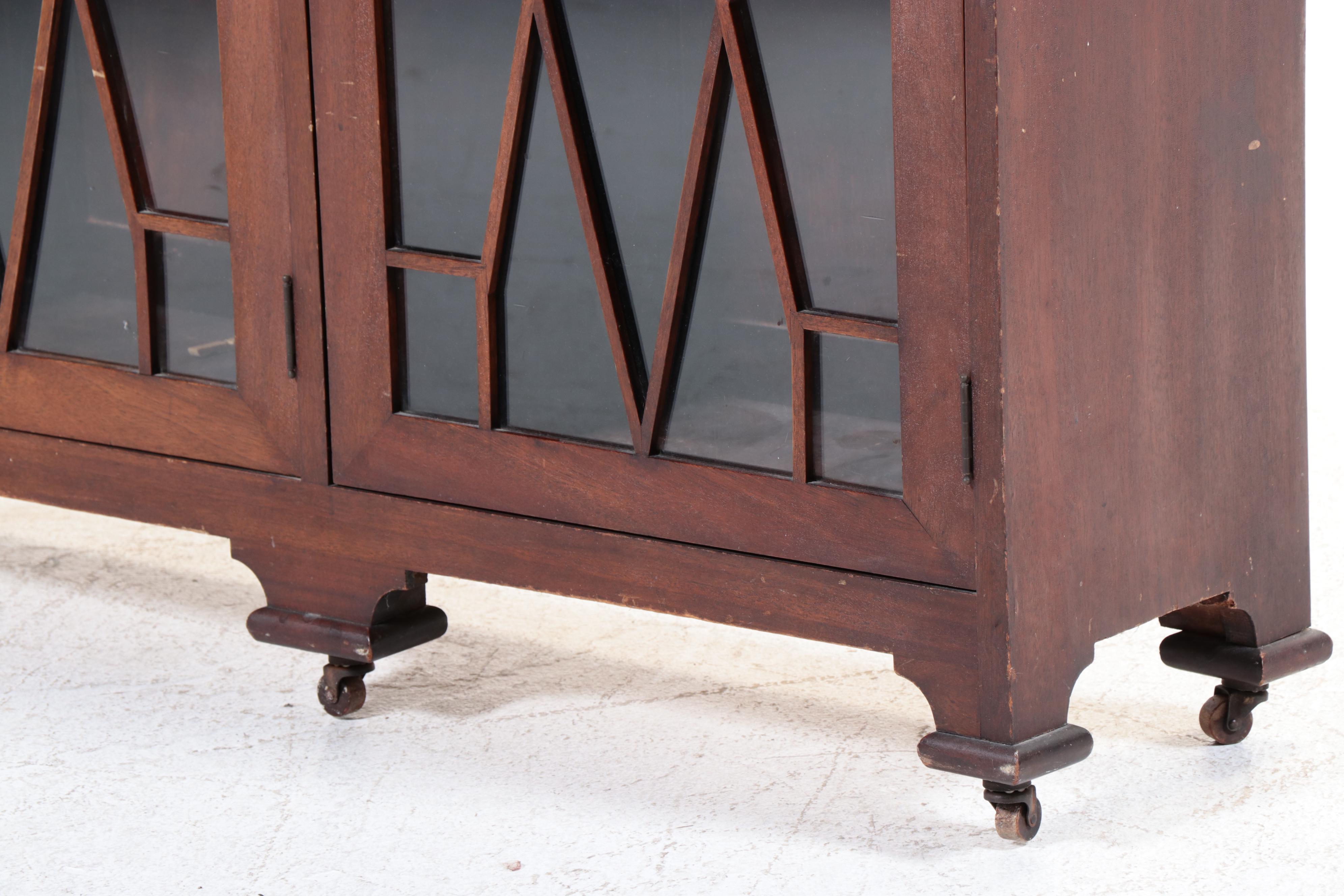 Chippendale Style Fretwork and Glass Front Bookcase on Casters, Early 20th C.