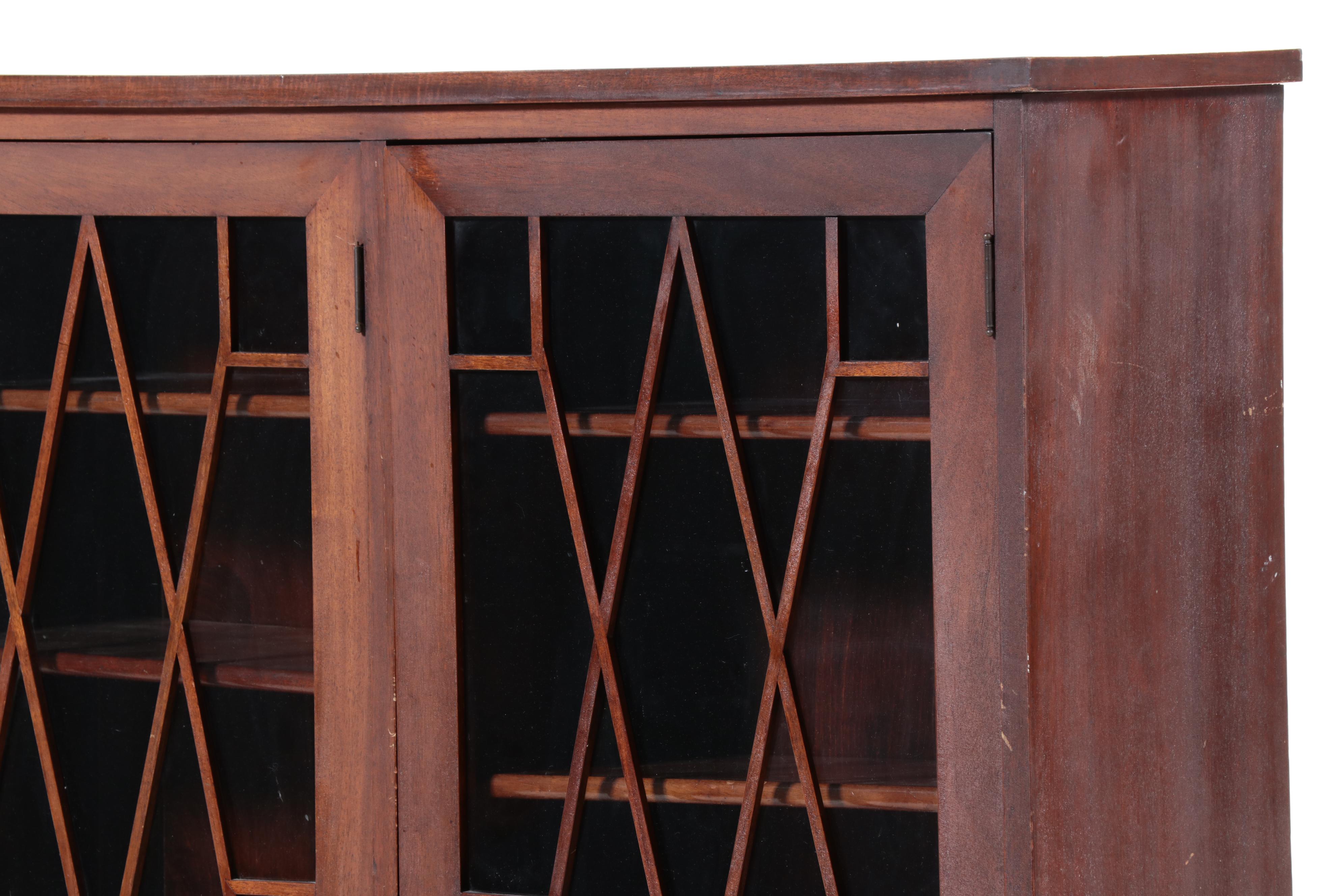Chippendale Style Fretwork and Glass Front Bookcase on Casters, Early 20th C.