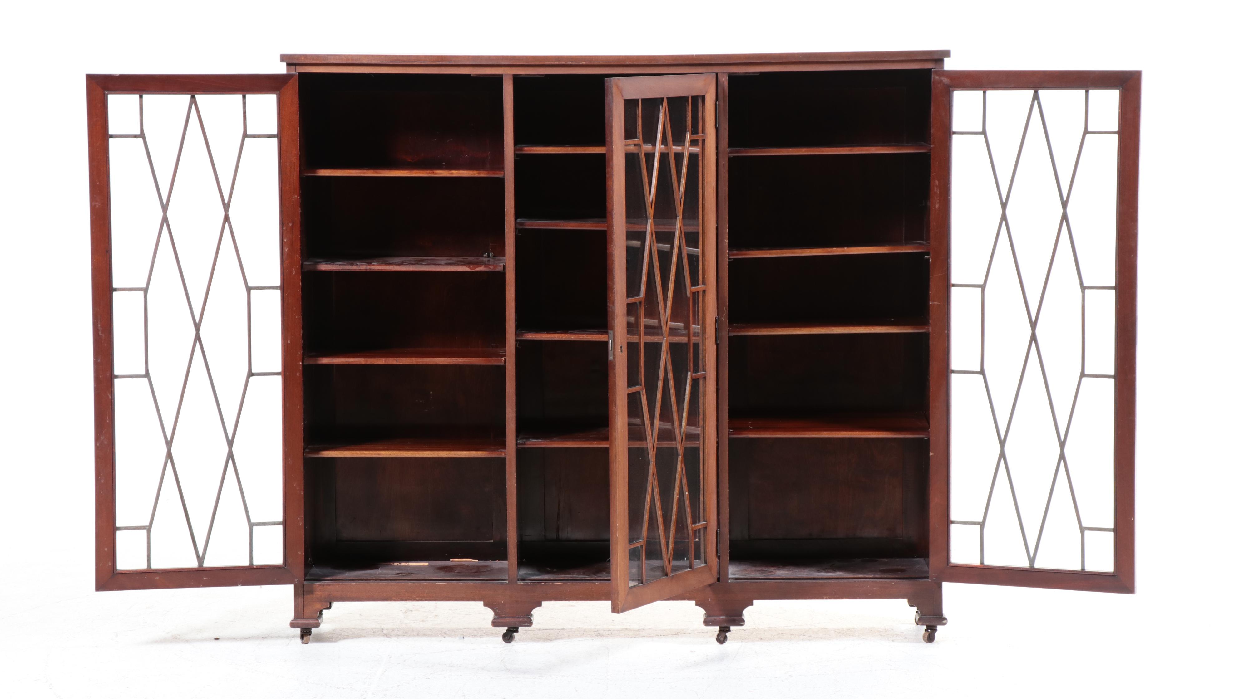 Chippendale Style Fretwork and Glass Front Bookcase on Casters, Early 20th C.