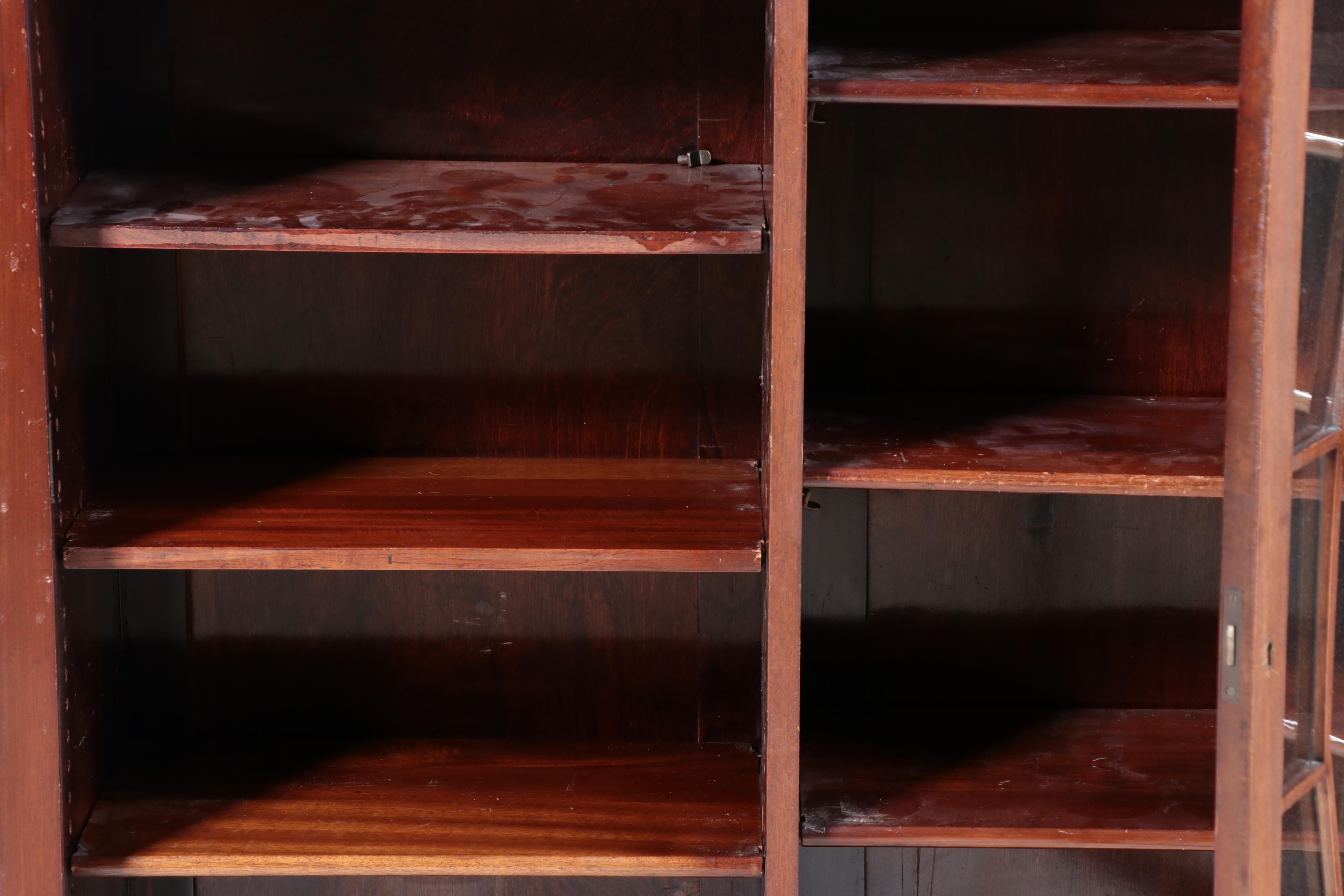 Chippendale Style Fretwork and Glass Front Bookcase on Casters, Early 20th C.