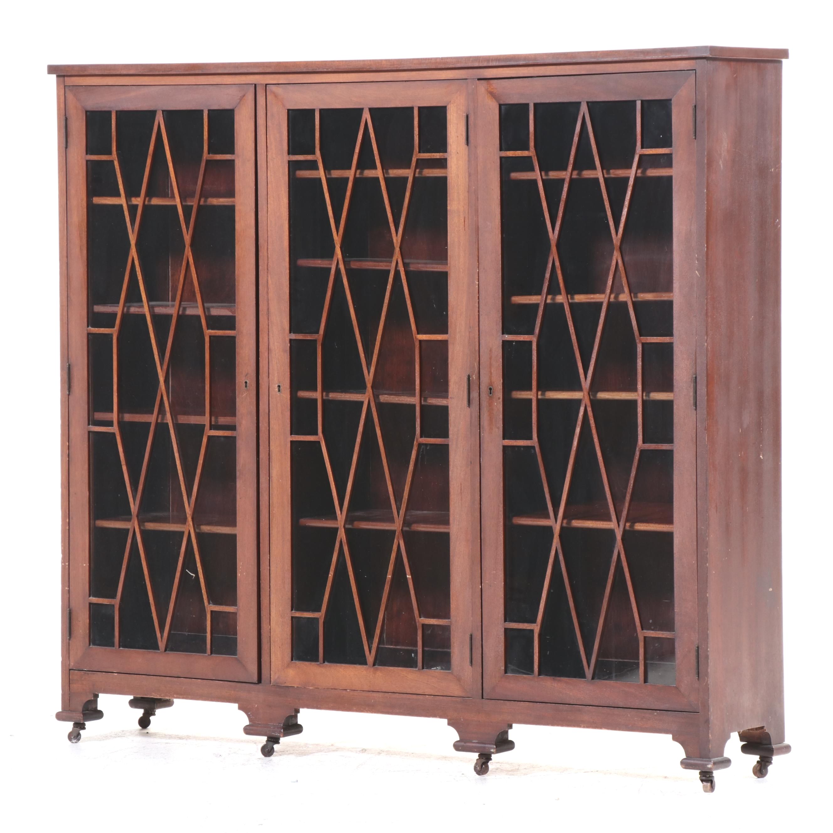 Chippendale Style Fretwork and Glass Front Bookcase on Casters, Early 20th C.