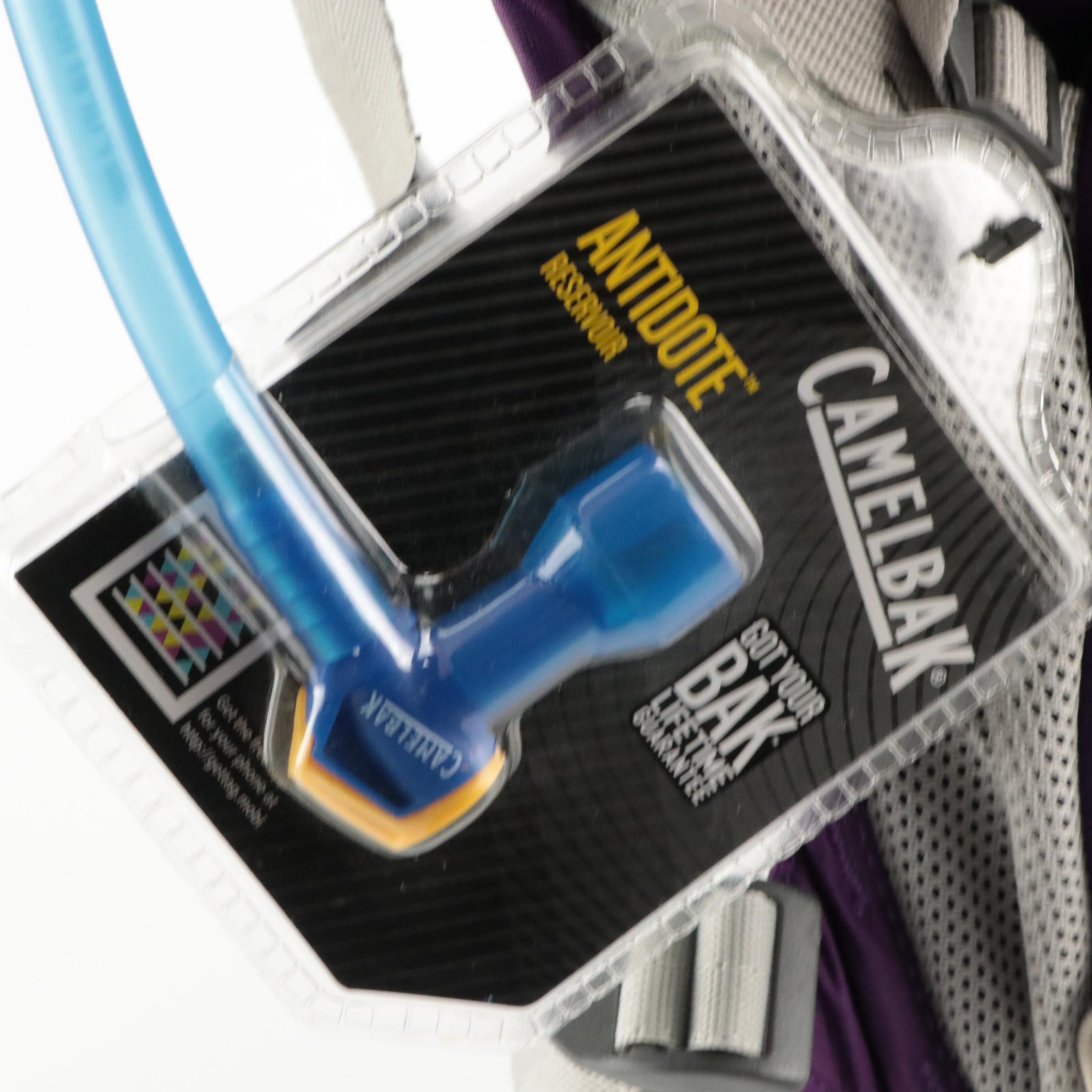 Camelbak Navy Blue Rim Runner Hiking Backpack and Purple Aurora Biking Pack