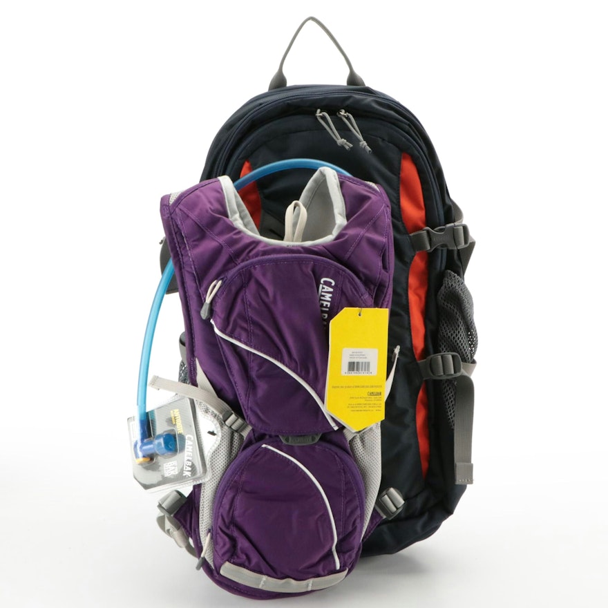 Camelbak Navy Blue Rim Runner Hiking Backpack and Purple Aurora Biking Pack