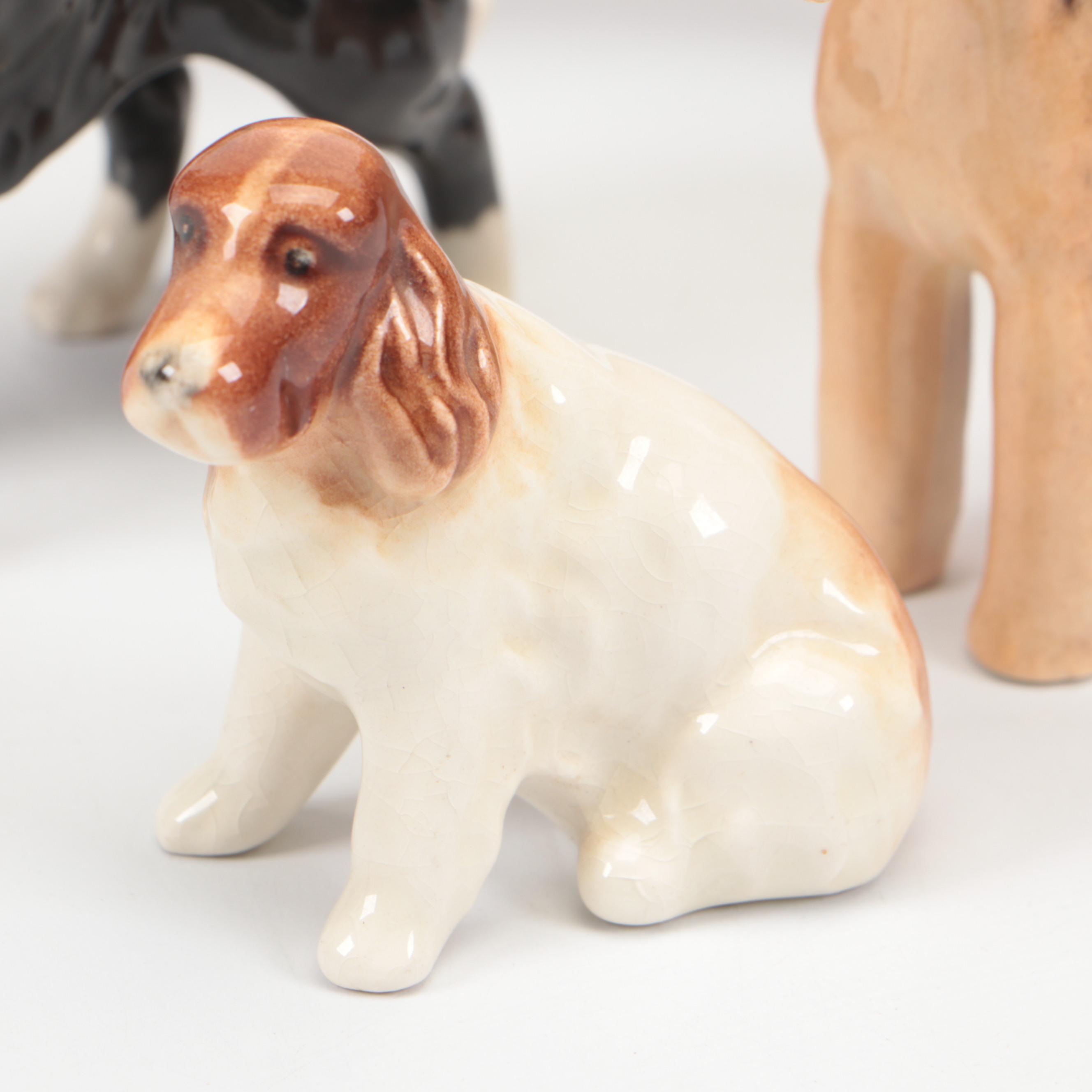 Beswick Border Collie, Spaniel, and Airedale with Royal Doulton Golden Retriever