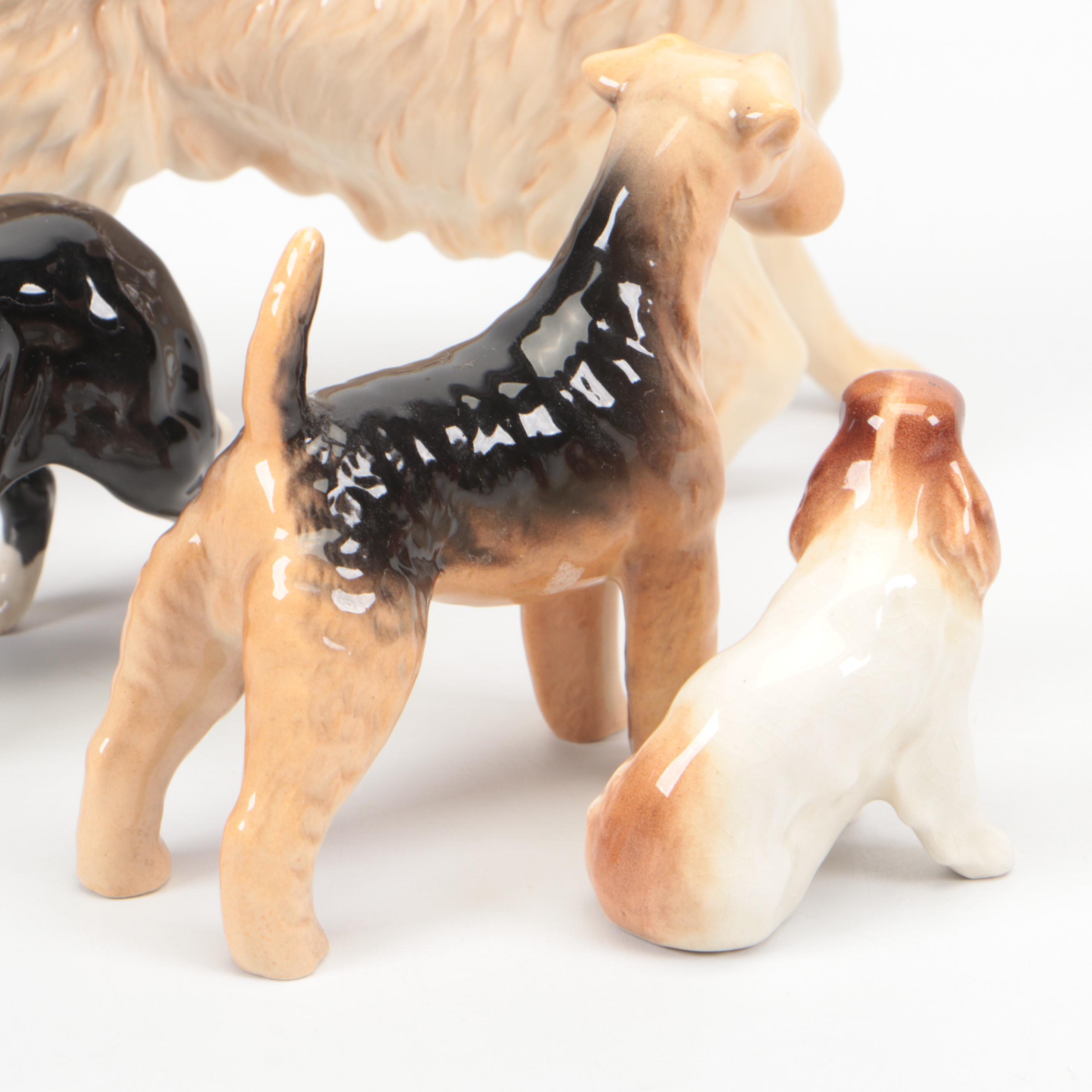 Beswick Border Collie, Spaniel, and Airedale with Royal Doulton Golden Retriever