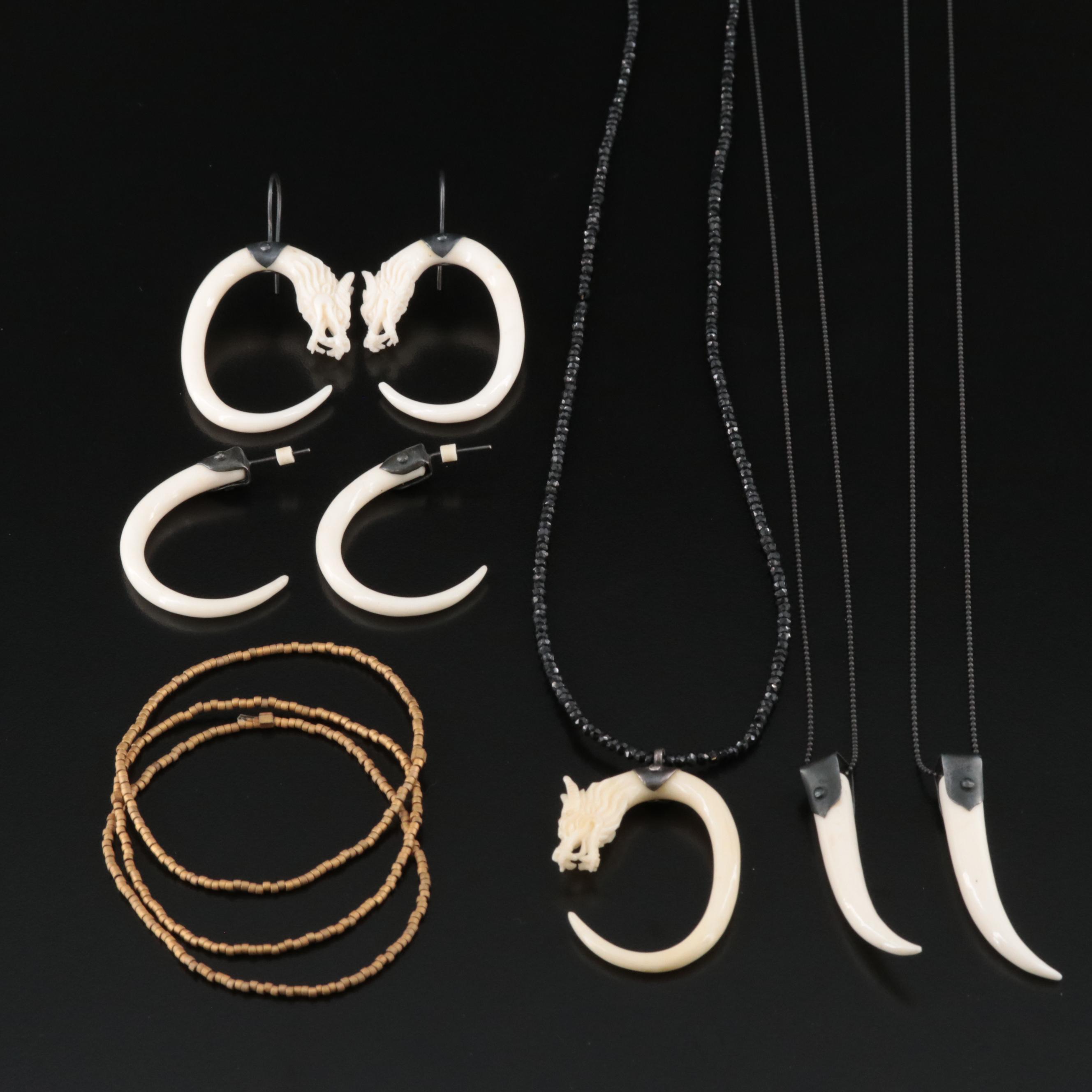 Carved Bone Dragon Pendant Necklaces and Earrings Featured in Collection