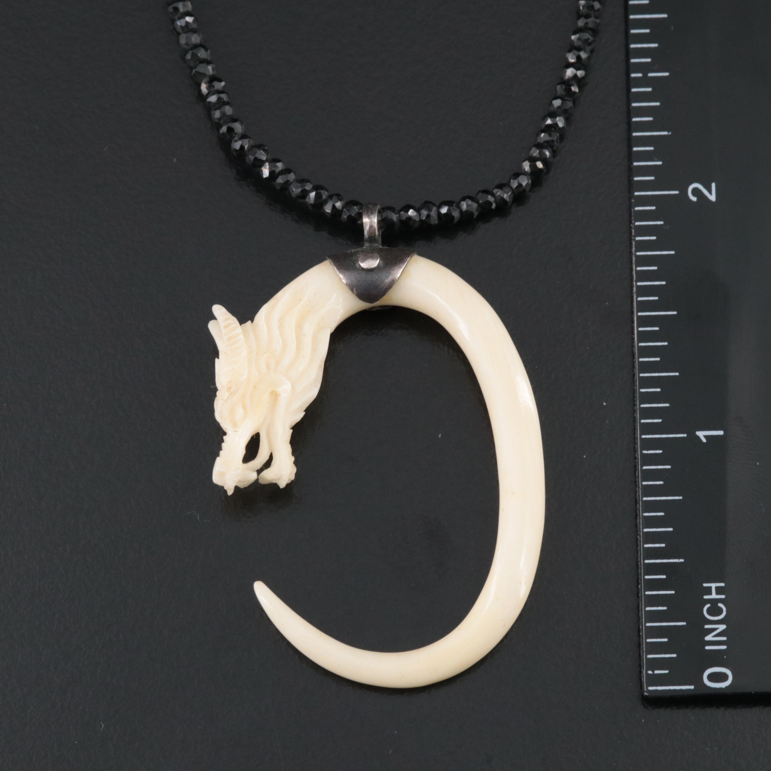 Carved Bone Dragon Pendant Necklaces and Earrings Featured in Collection