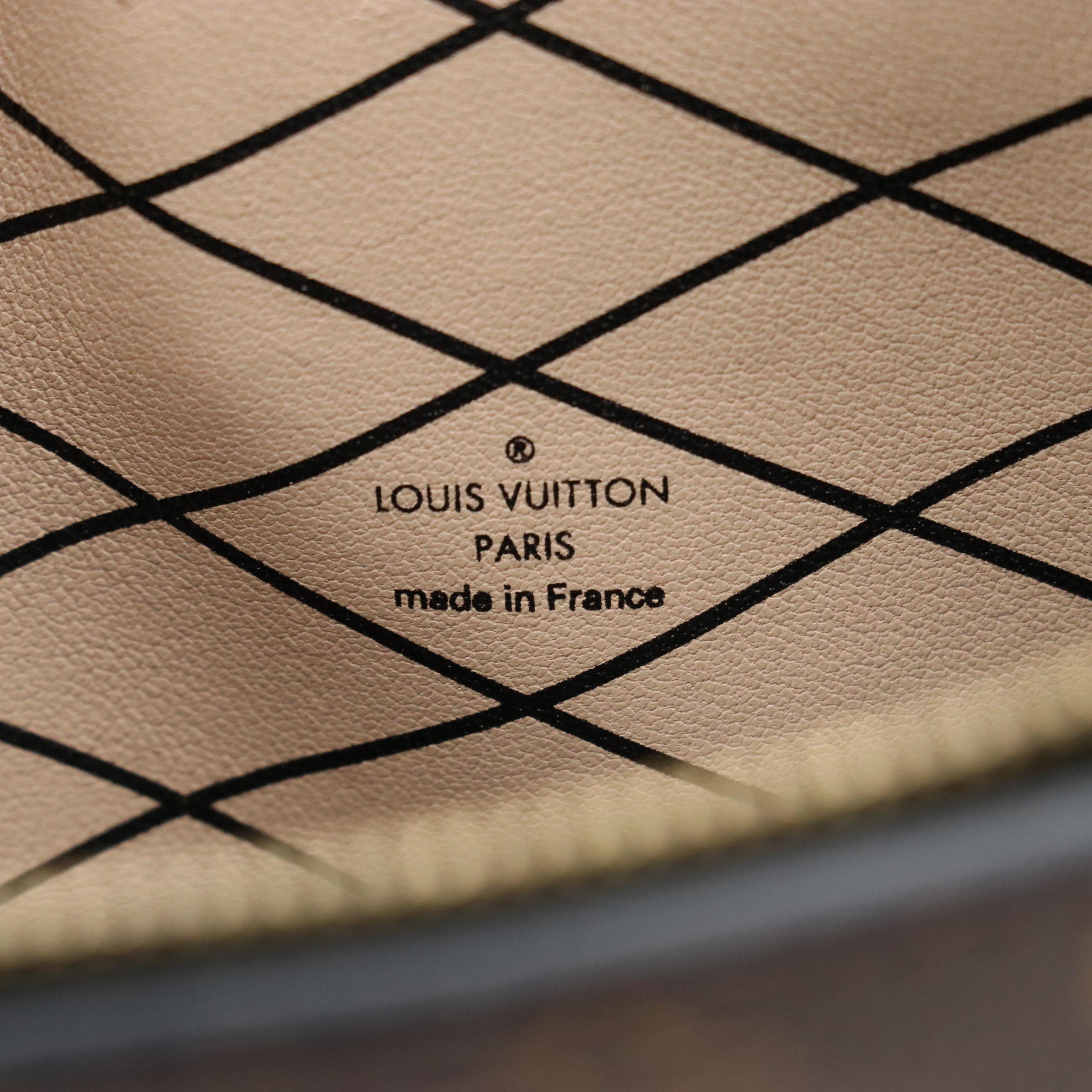 Louis Vuitton Convertible Trunk Clutch in Monogram Reverse Canvas and Leather